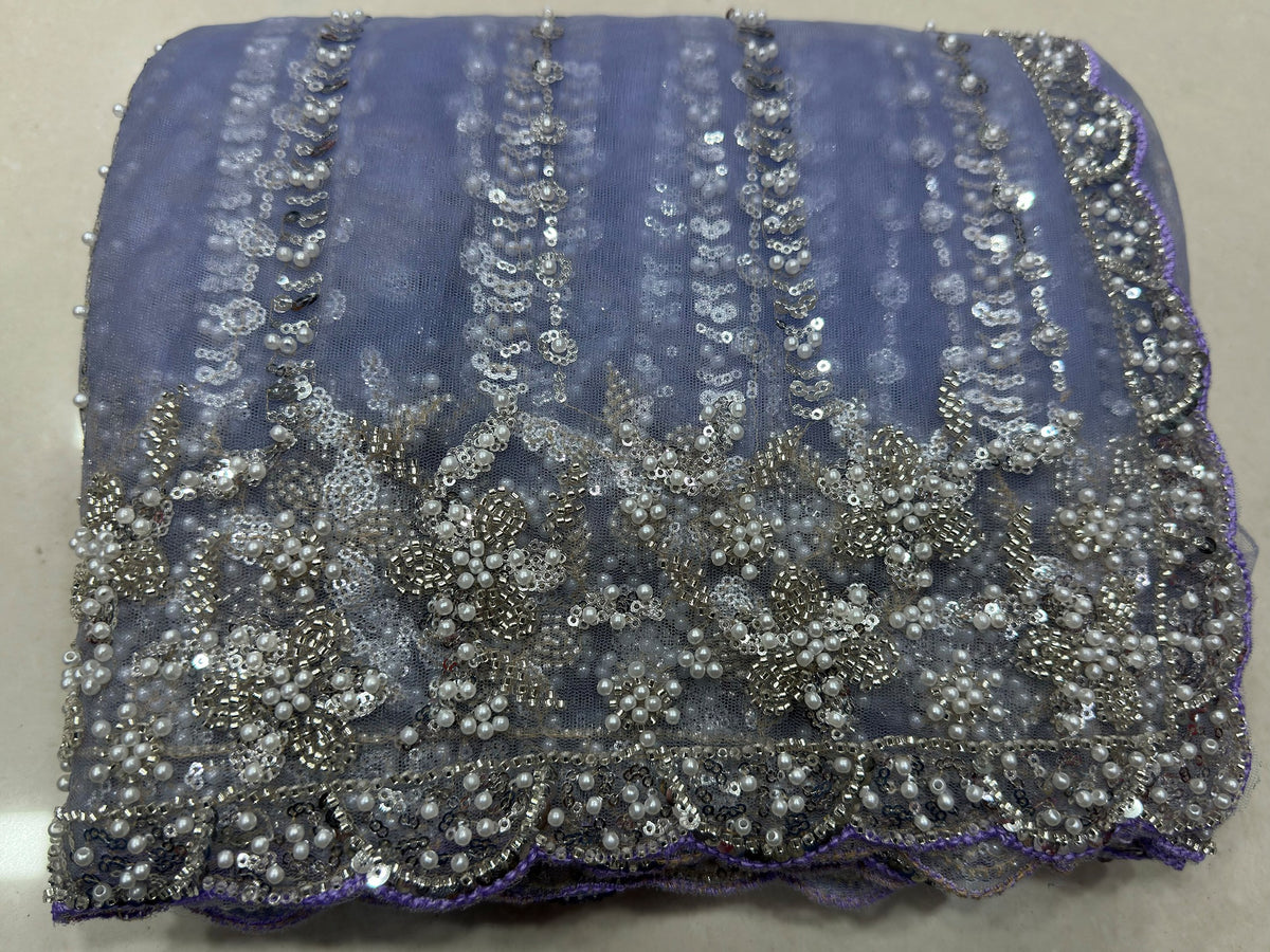 Mesmerizing Blue Pearl Work Net Reception Wear Saree