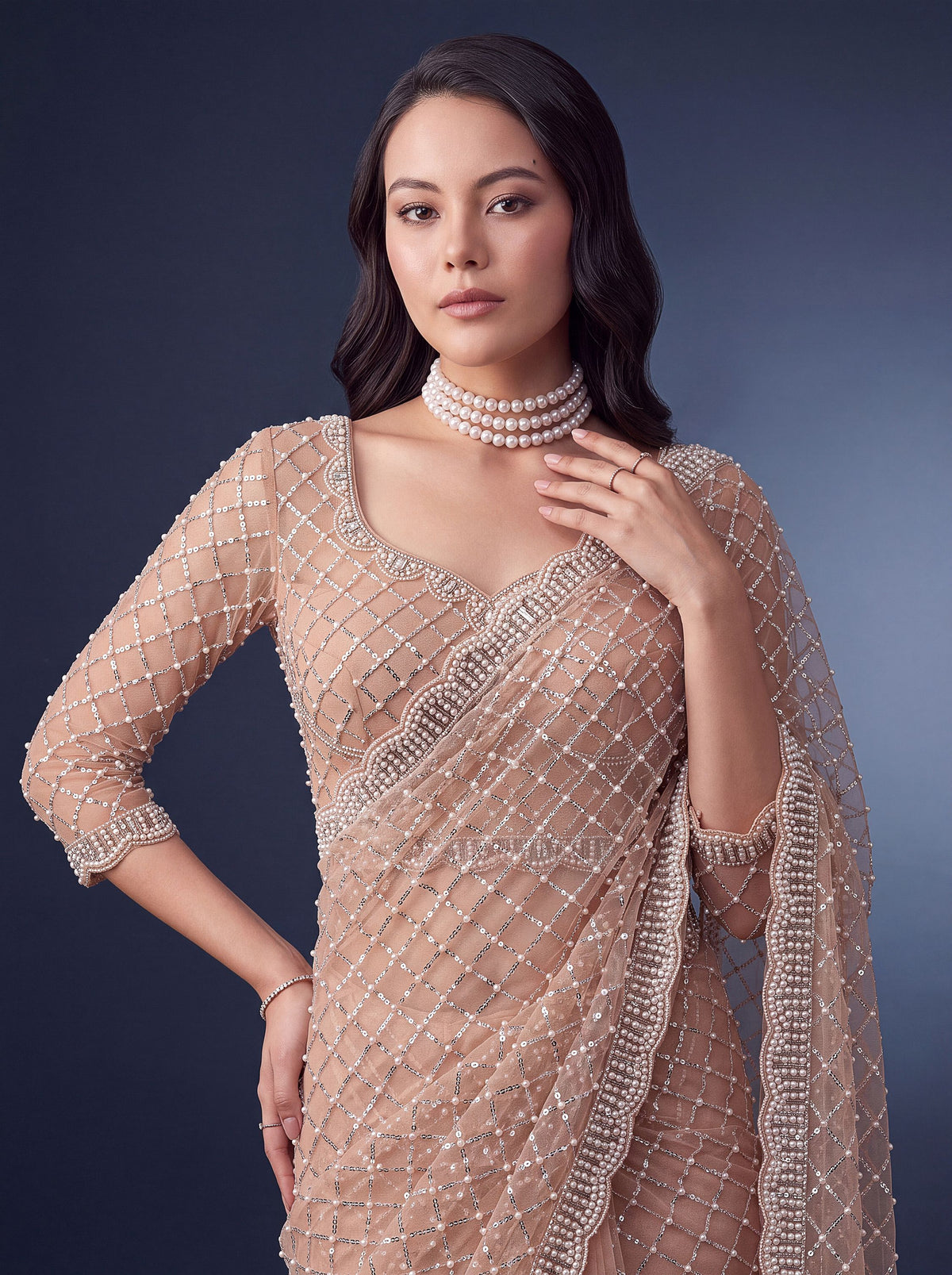 Graceful Peach Beads Work Net Reception Wear Saree