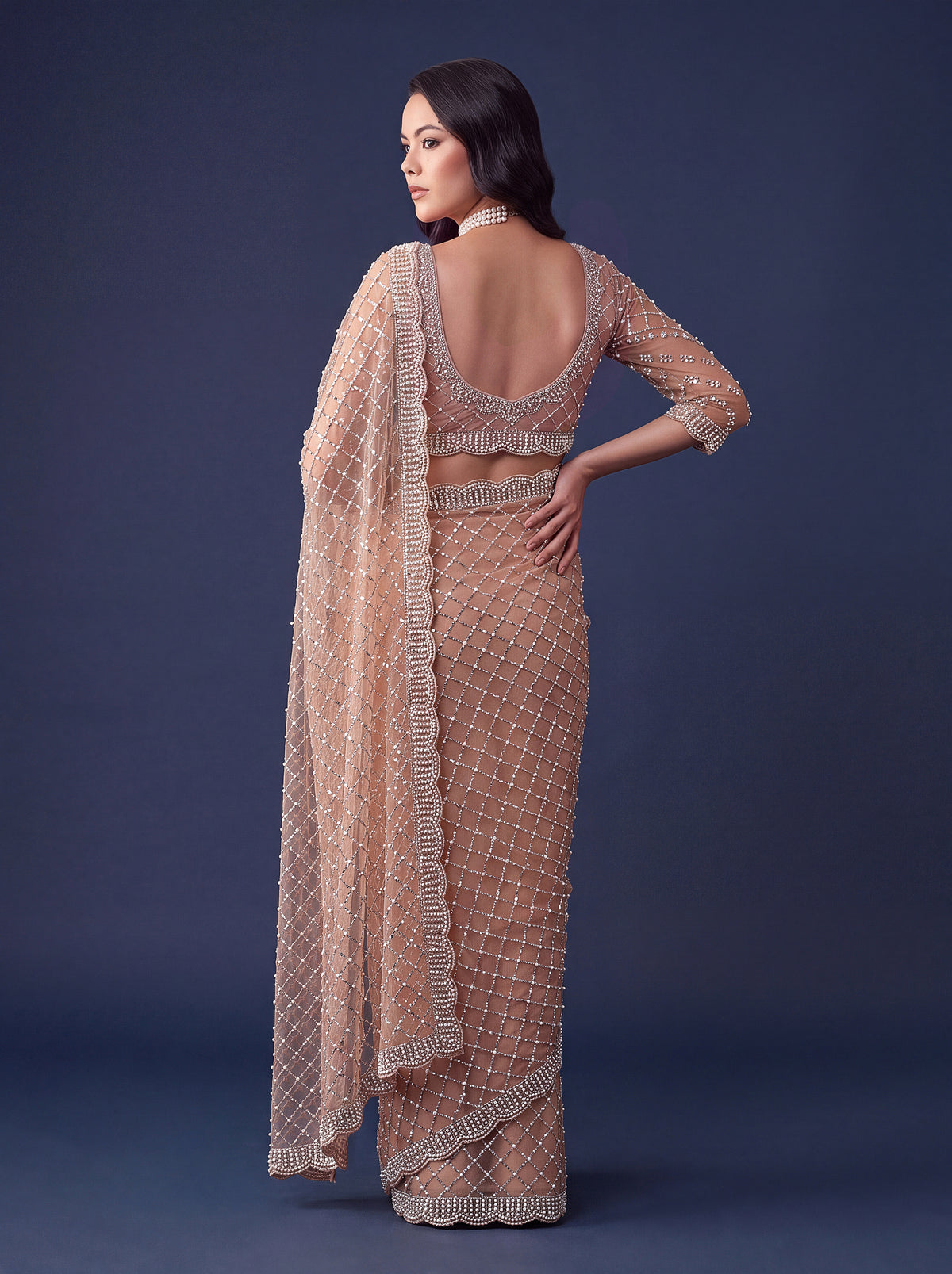 Graceful Peach Beads Work Net Reception Wear Saree