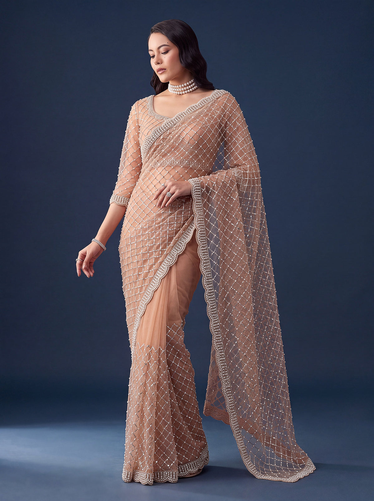 Graceful Peach Beads Work Net Reception Wear Saree