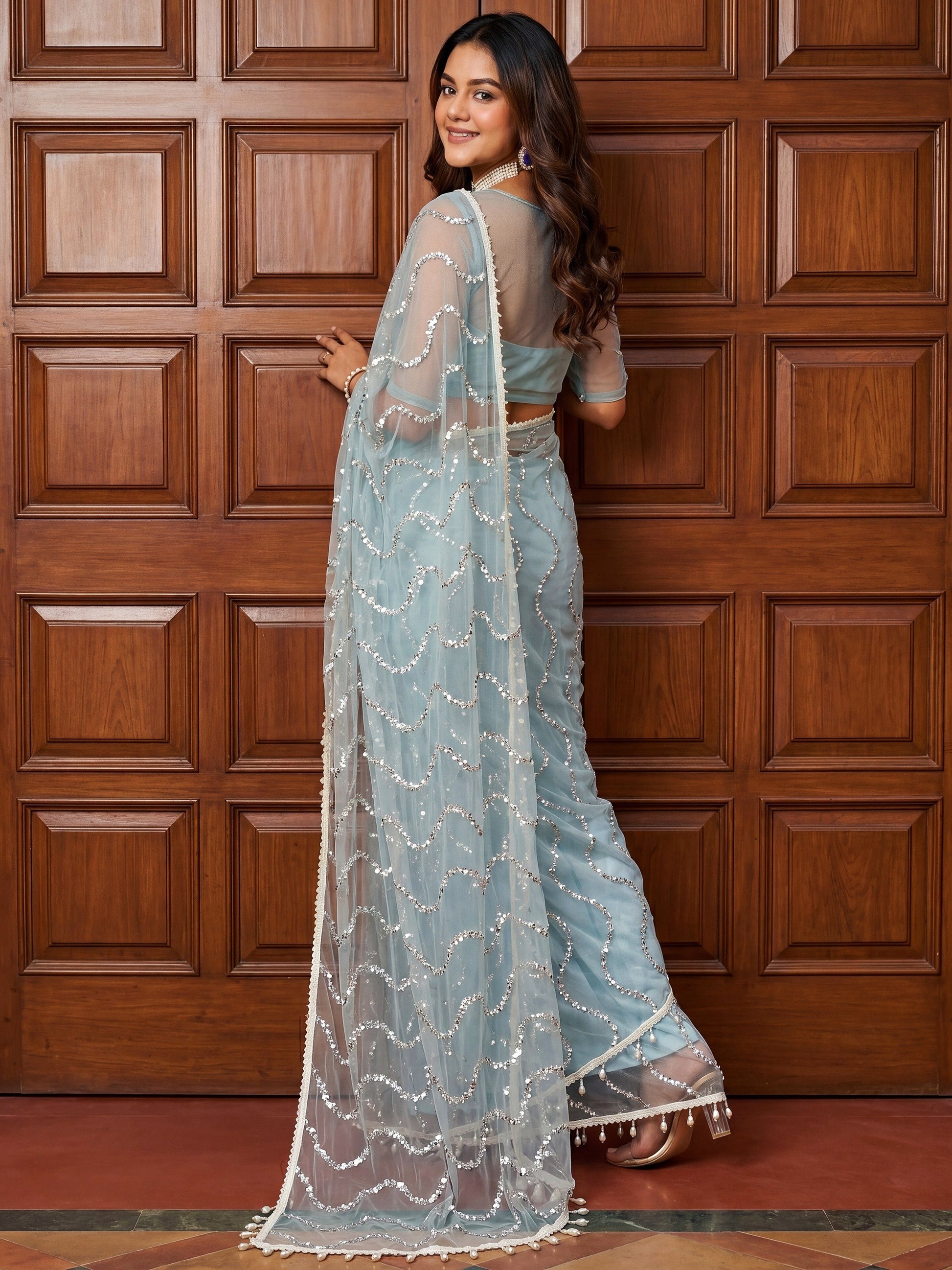 Gorgeous Sky Blue Sequins Work Net Party Wear Saree With Blouse