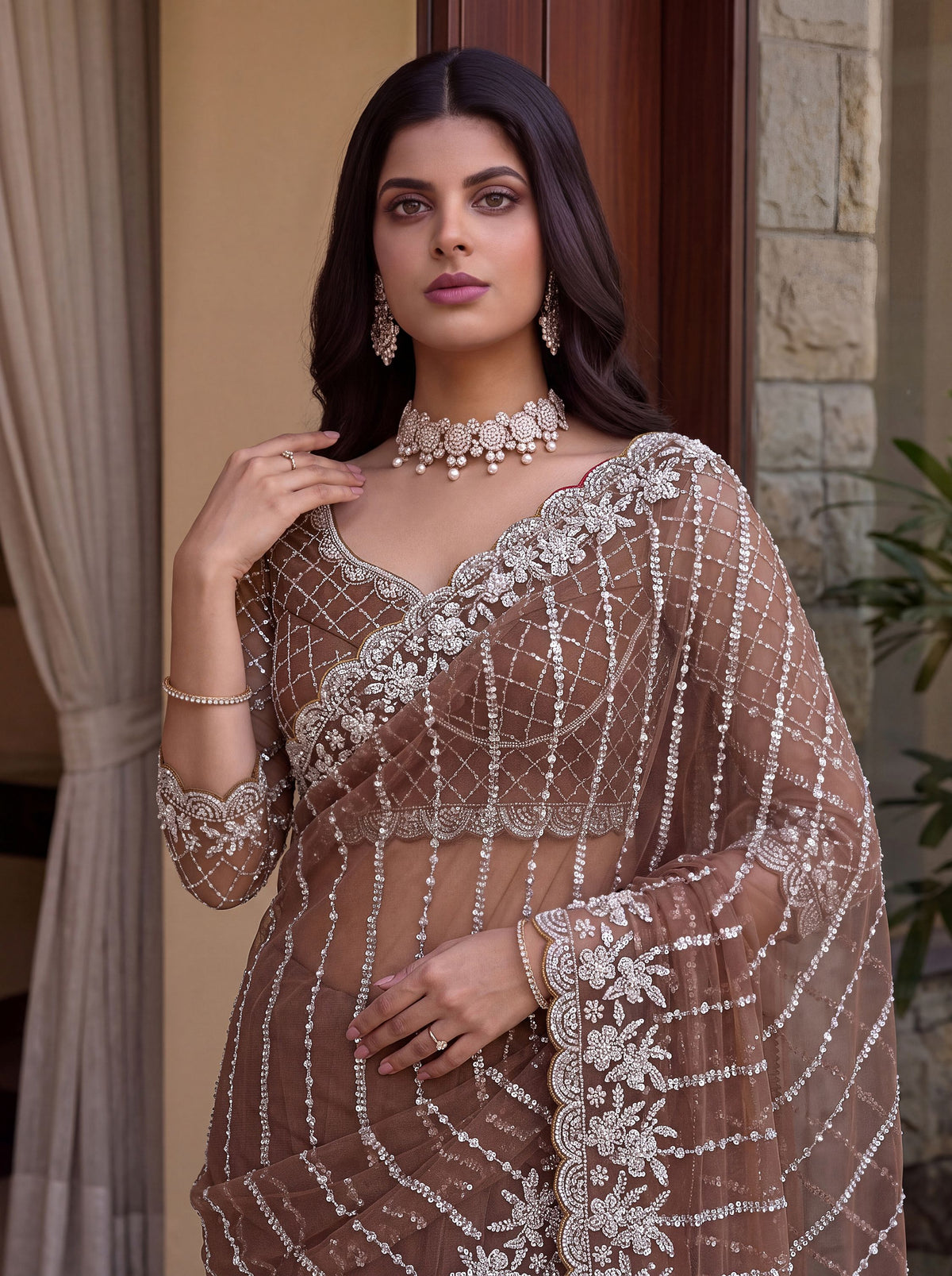Captivating Brown Beads Work Net Party Wear Saree With Blouse