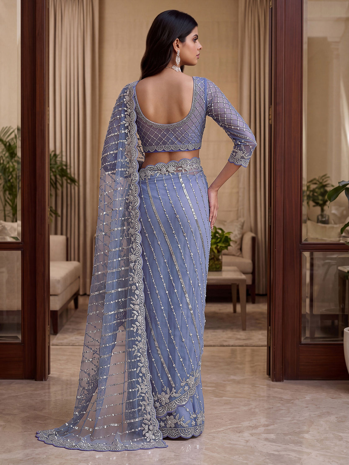 Mesmerizing Blue Pearl Work Net Reception Wear Saree