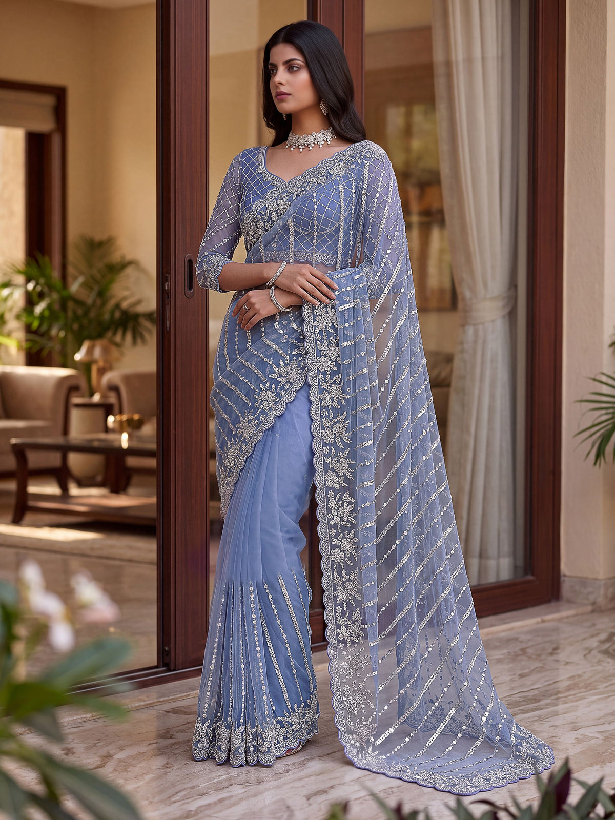 Mesmerizing Blue Pearl Work Net Reception Wear Saree