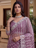 Enchanting Mauve Beads Work Net Wedding Wear Saree With Blouse