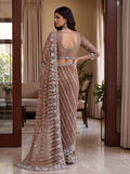 Captivating Brown Beads Work Net Party Wear Saree With Blouse