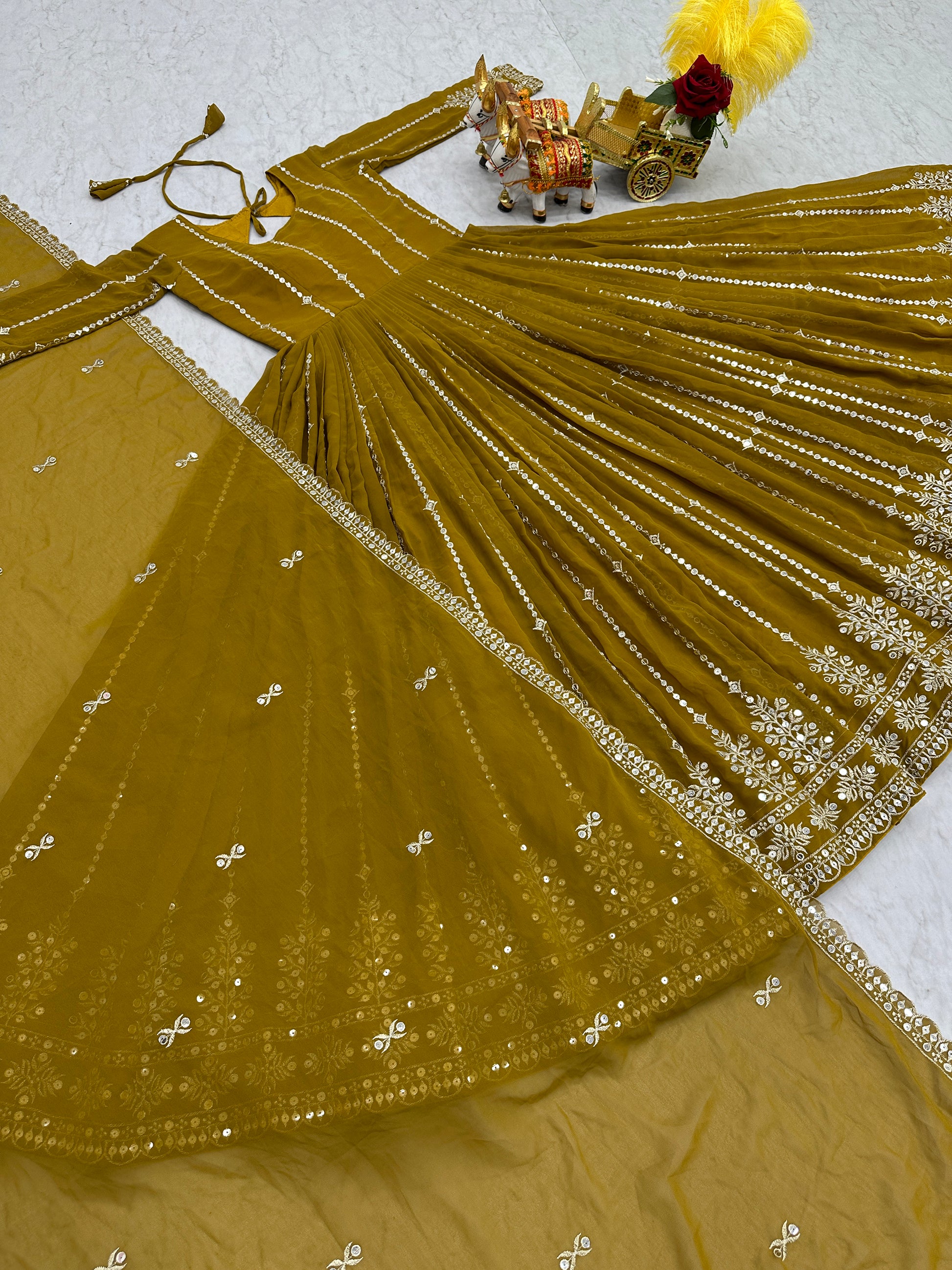 Gorgeous Olive Green Sequins Georgette Mehendi Wear Gown