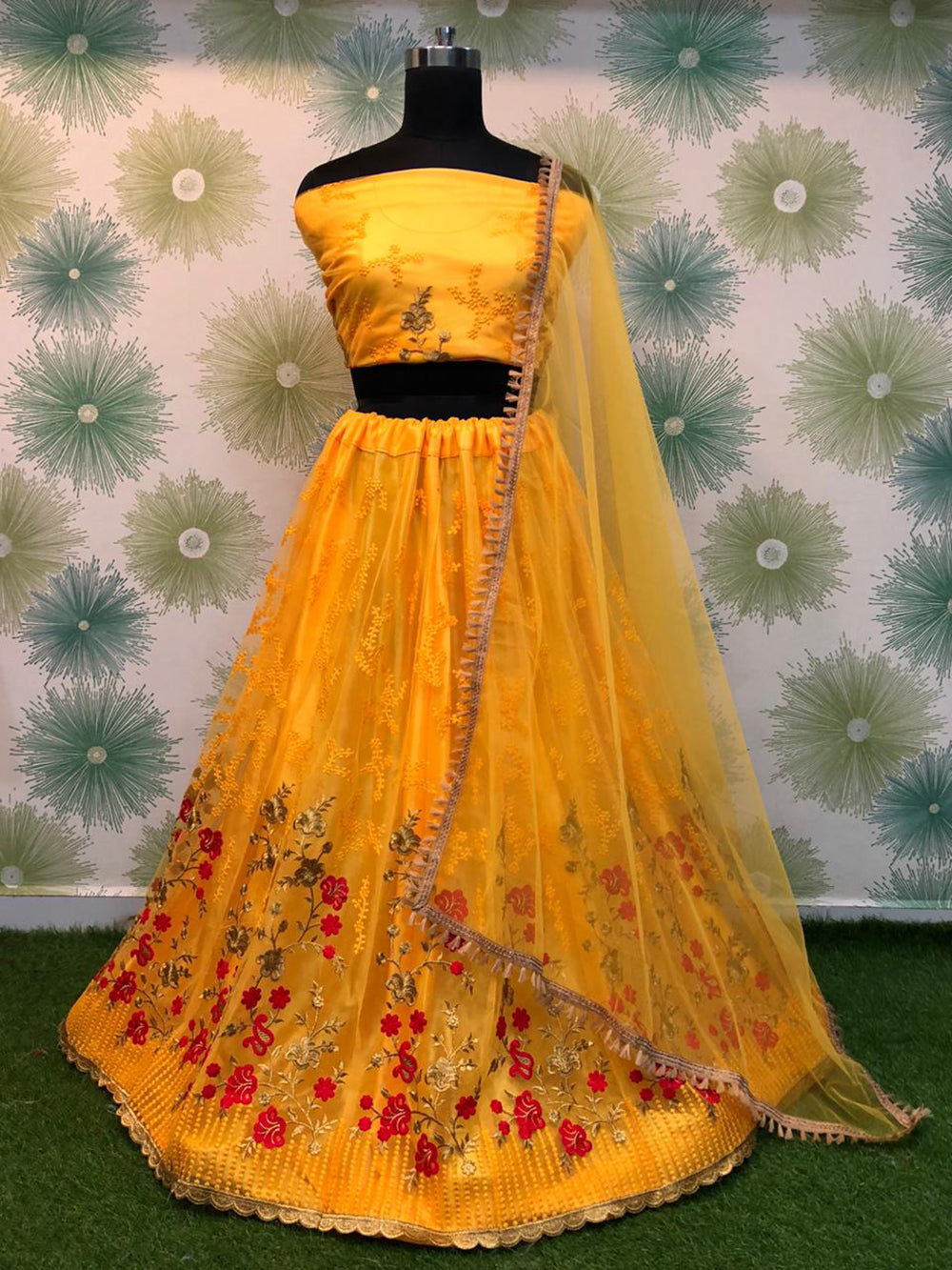 Spectacular Yellow Thread Work Net Lehenga Choli With Dupatta