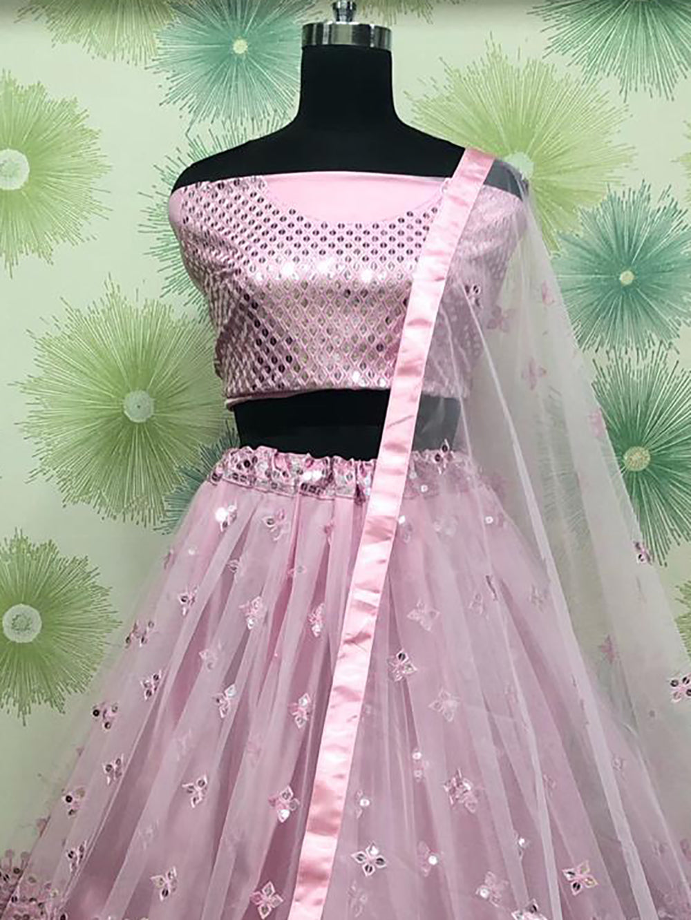 Bewitching Pink Sequins Net Engagement Wear Lehenga Choli