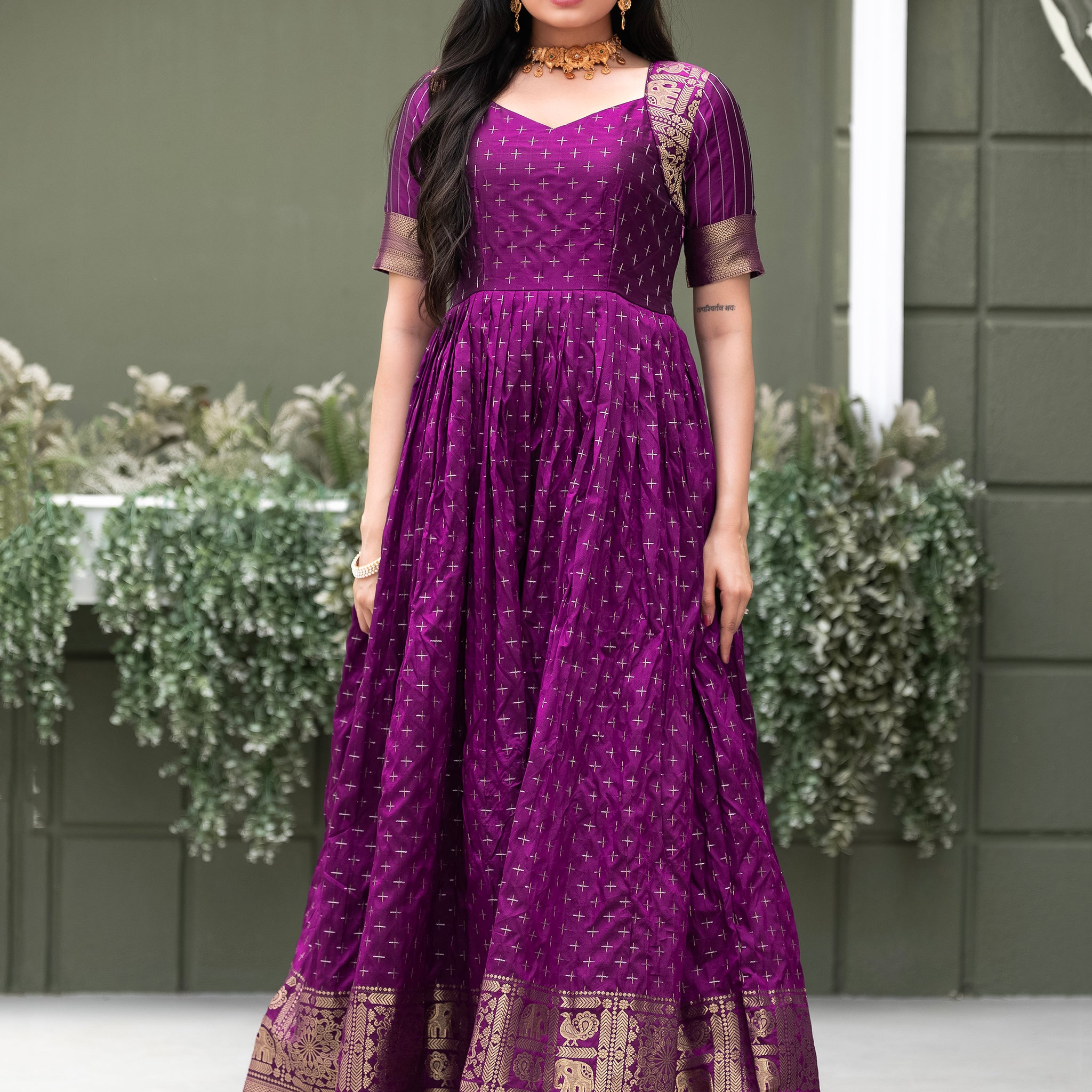 Tantalizing Purple Zari Weaving Silk Festival Wear Gown