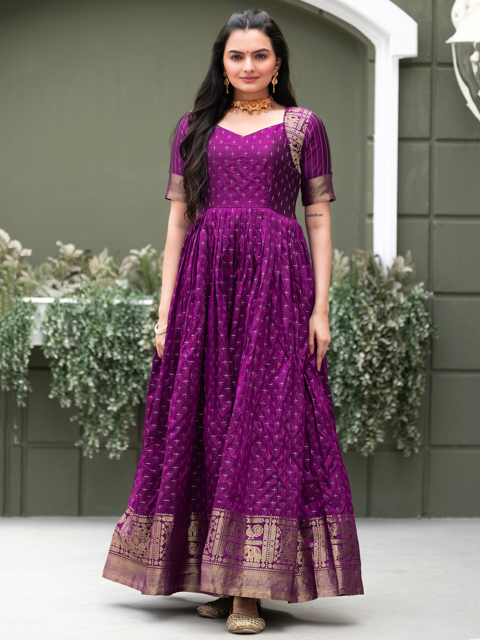 Tantalizing Purple Zari Weaving Silk Festival Wear Gown