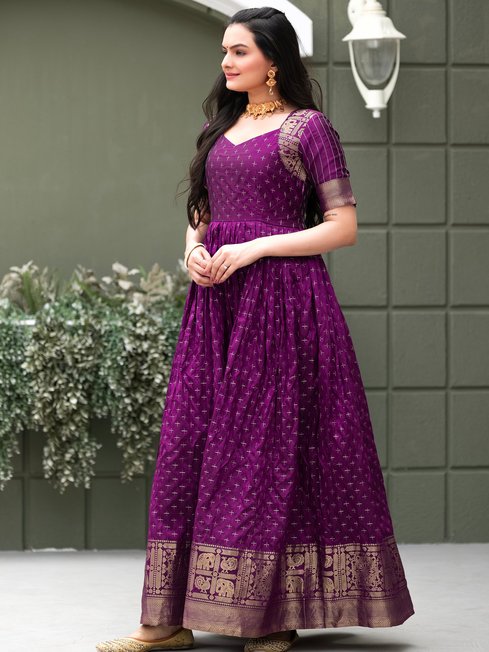 Tantalizing Purple Zari Weaving Silk Festival Wear Gown