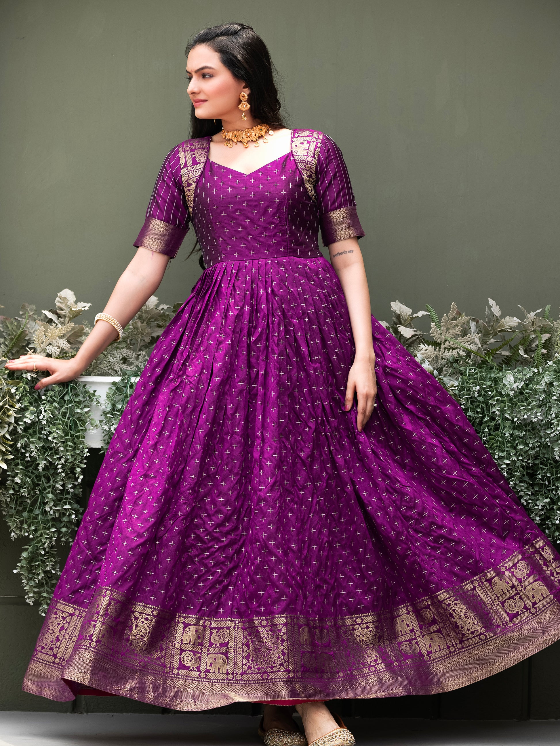 Tantalizing Purple Zari Weaving Silk Festival Wear Gown