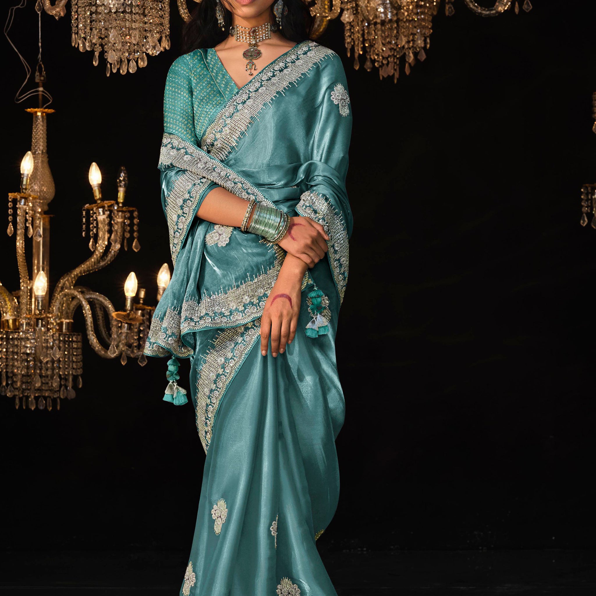 Fascinating Teal Blue Embroidered Tissue Silk Engagement Wear Saree