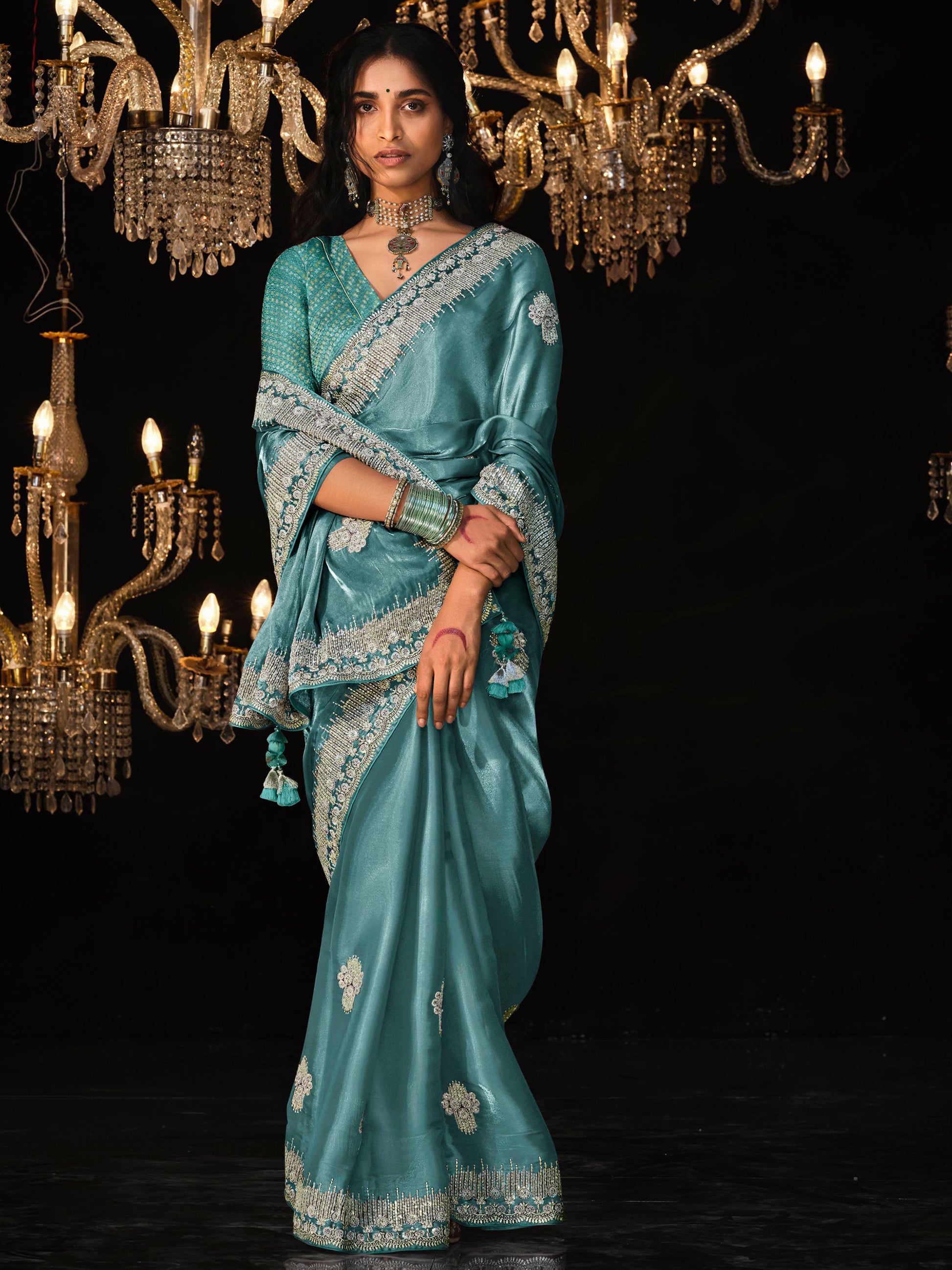 Fascinating Teal Blue Embroidered Tissue Silk Engagement Wear Saree