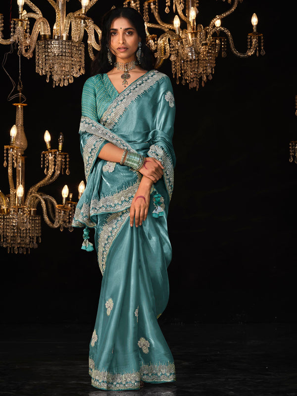 Fascinating Teal Blue Embroidered Tissue Silk Engagement Wear Saree