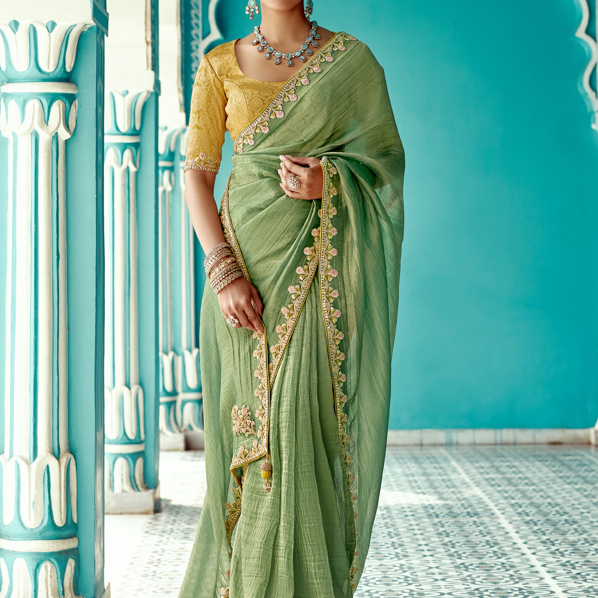 Bewitching Pista Green Thread Bordered Tissue Silk Traditional Saree