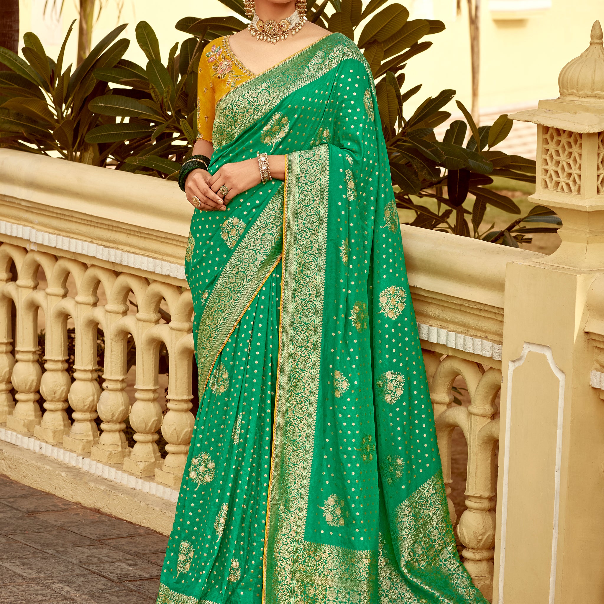 Captivating Green Zari Weaving Dola Silk Festive Wear Saree