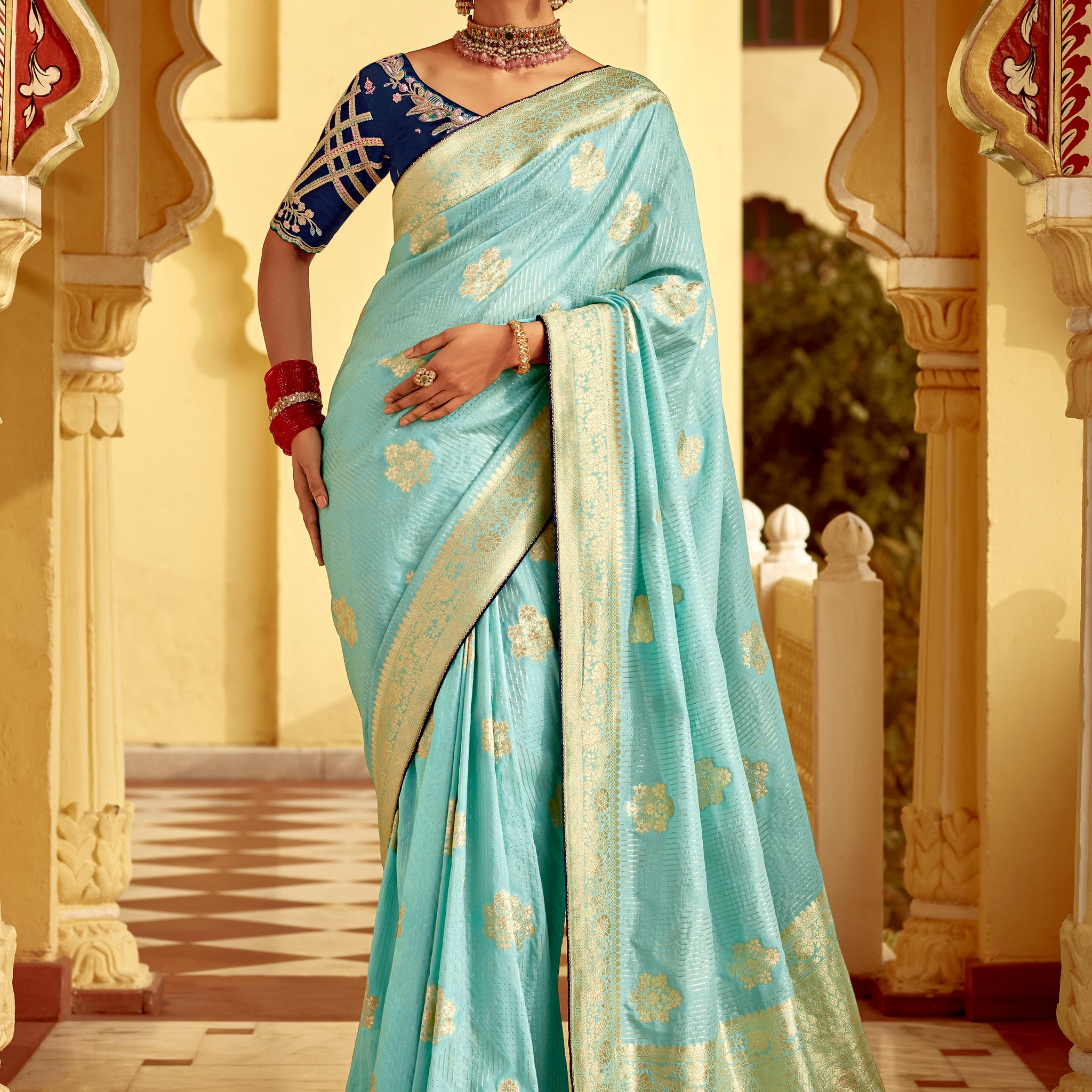 Majestic Sky Blue Zari Weaving Dola Silk Festive Wear Saree With Blouse