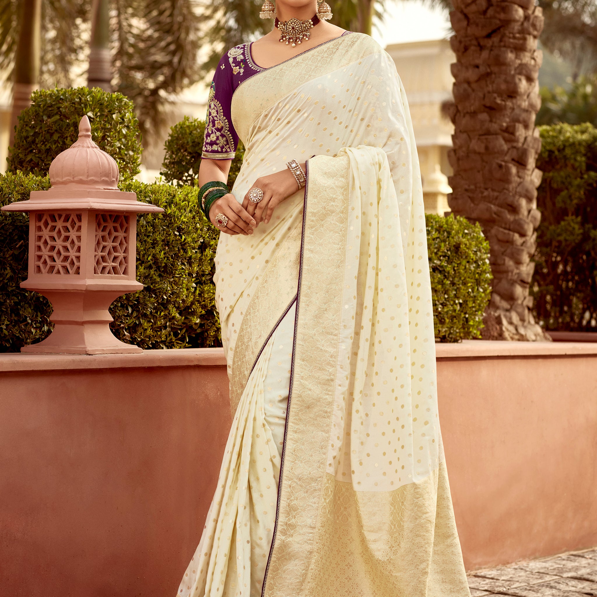Alluring Off-White Zari Weaving Dola Silk Festive Wear Saree With Blouse