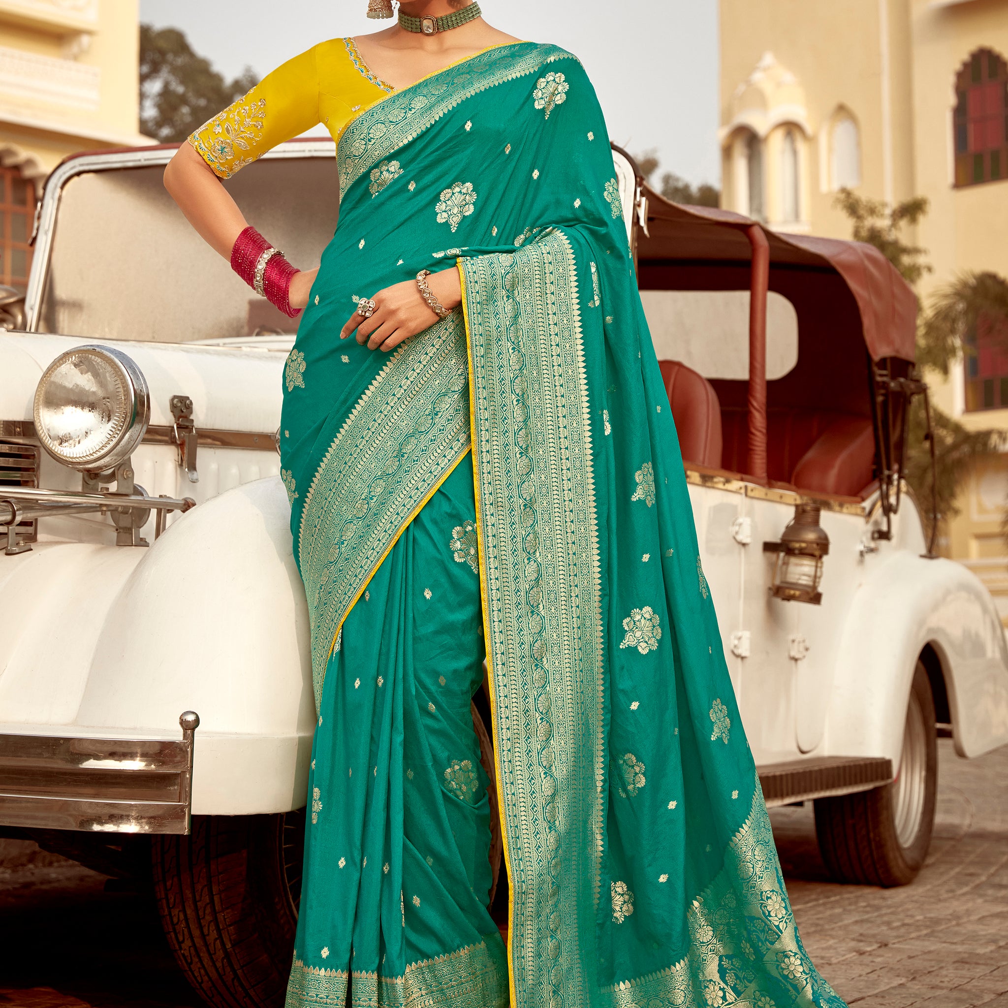 Attractive Teal Green Zari Weaving Dola Silk Engagement Wear Saree With Blouse