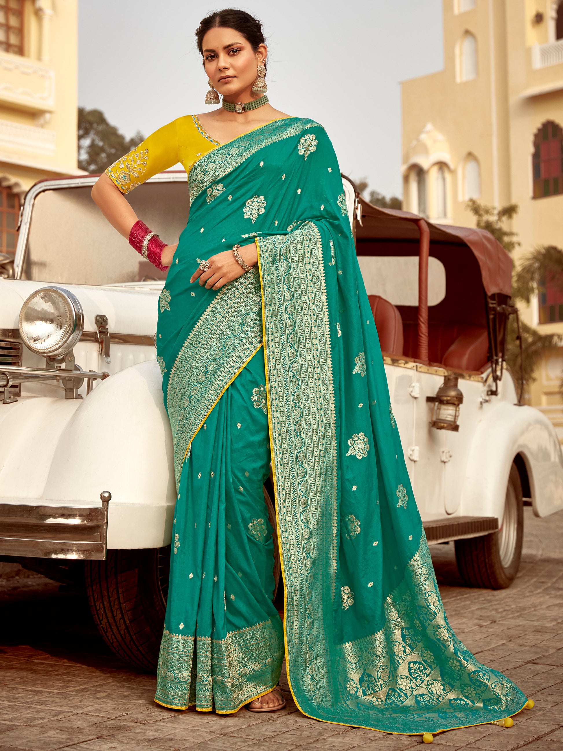 Attractive Teal Green Zari Weaving Dola Silk Engagement Wear Saree With Blouse