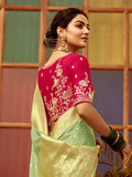Charming Pista Green Zari Weaving Dola Silk Traditional Saree With Blouse
