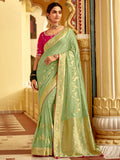 Charming Pista Green Zari Weaving Dola Silk Traditional Saree With Blouse