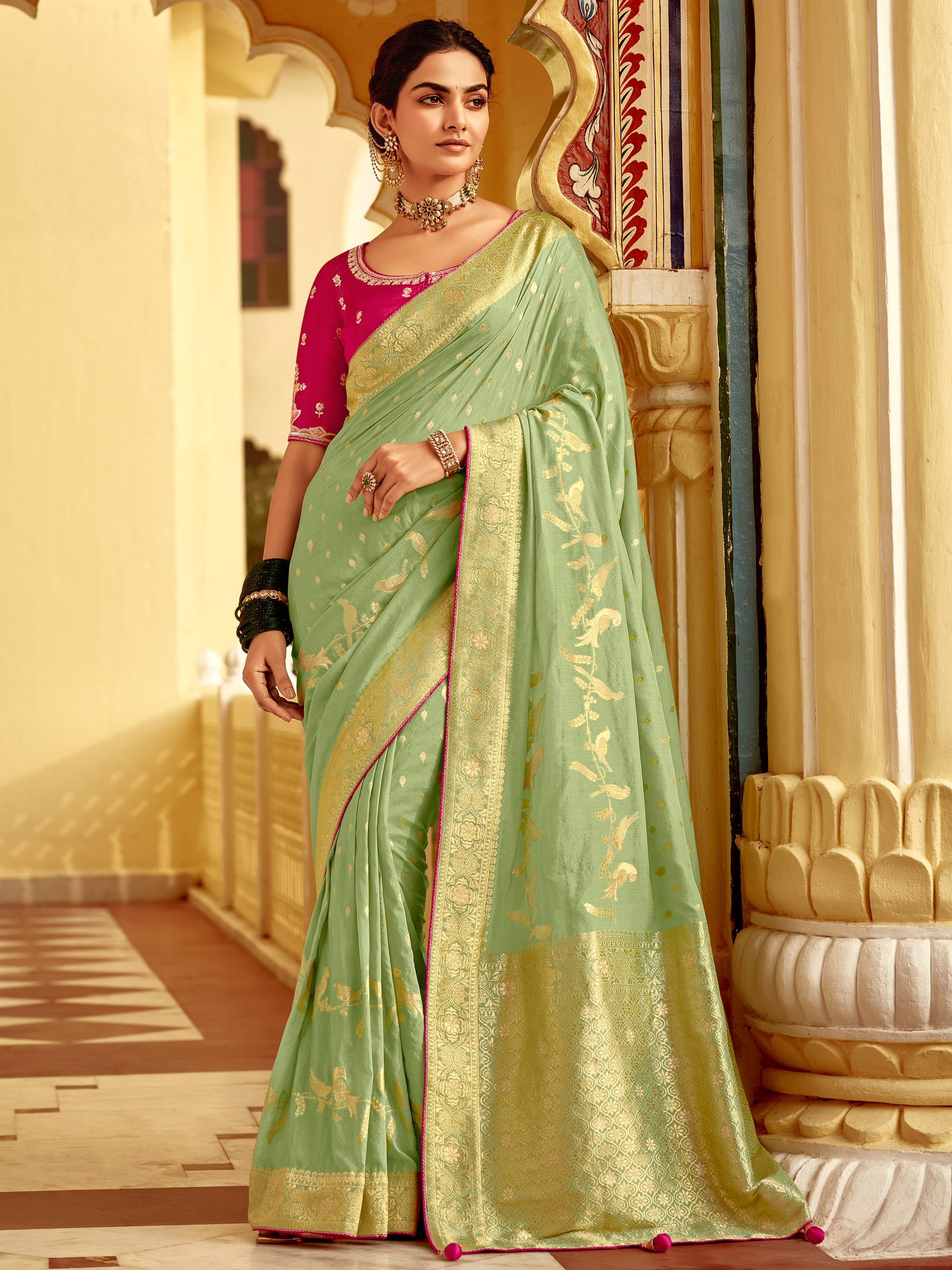 Charming Pista Green Zari Weaving Dola Silk Traditional Saree With Blouse