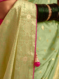 Charming Pista Green Zari Weaving Dola Silk Traditional Saree With Blouse
