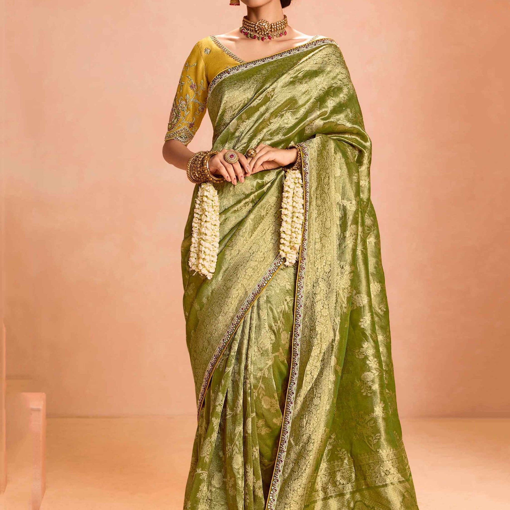 Delightful Green Zari Weaving Silk Mehendi Wear Saree With Blouse
