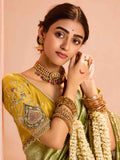 Delightful Green Zari Weaving Silk Mehendi Wear Saree With Blouse