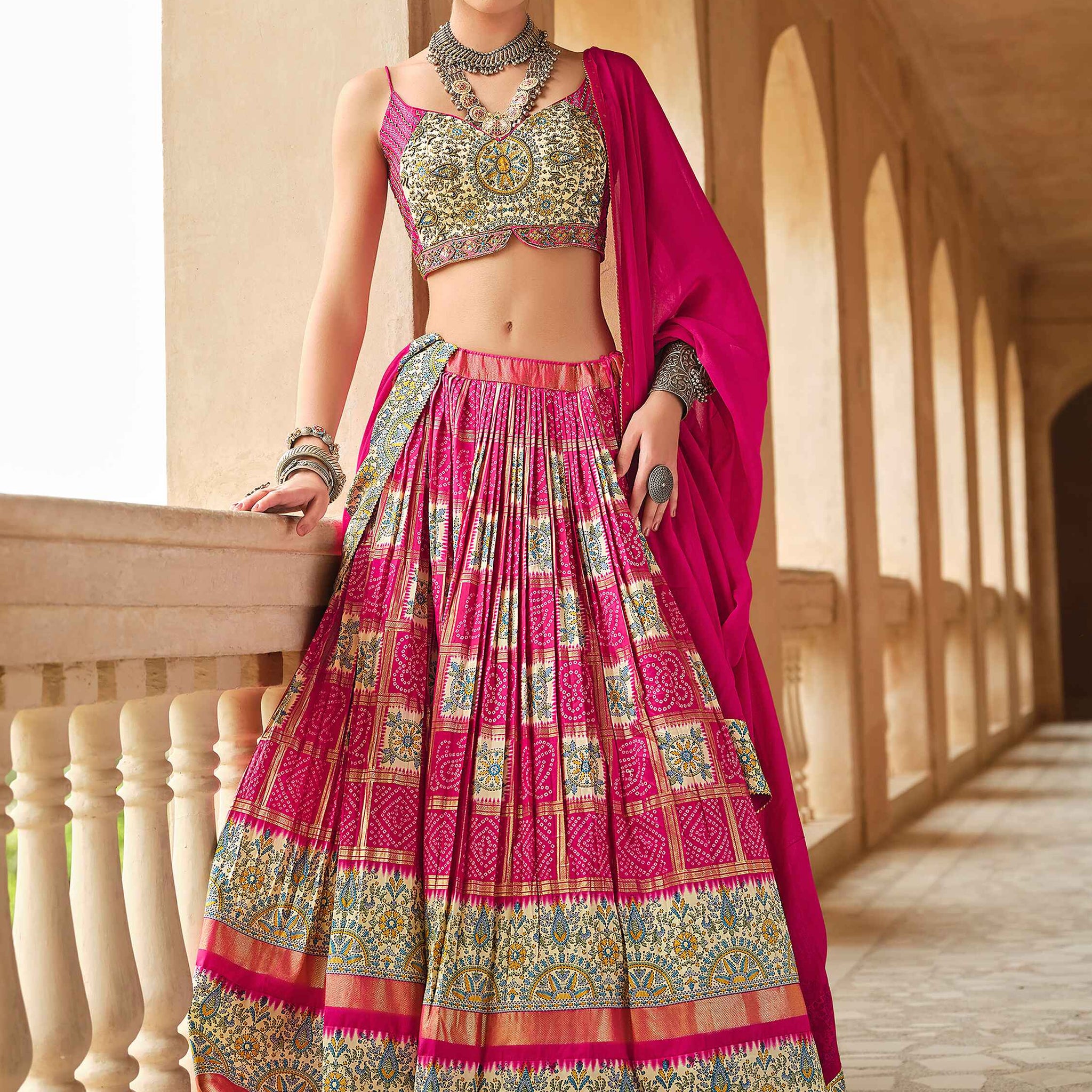 Delightful Pink Bandhani Print Silk Wedding Wear Lehenga Choli