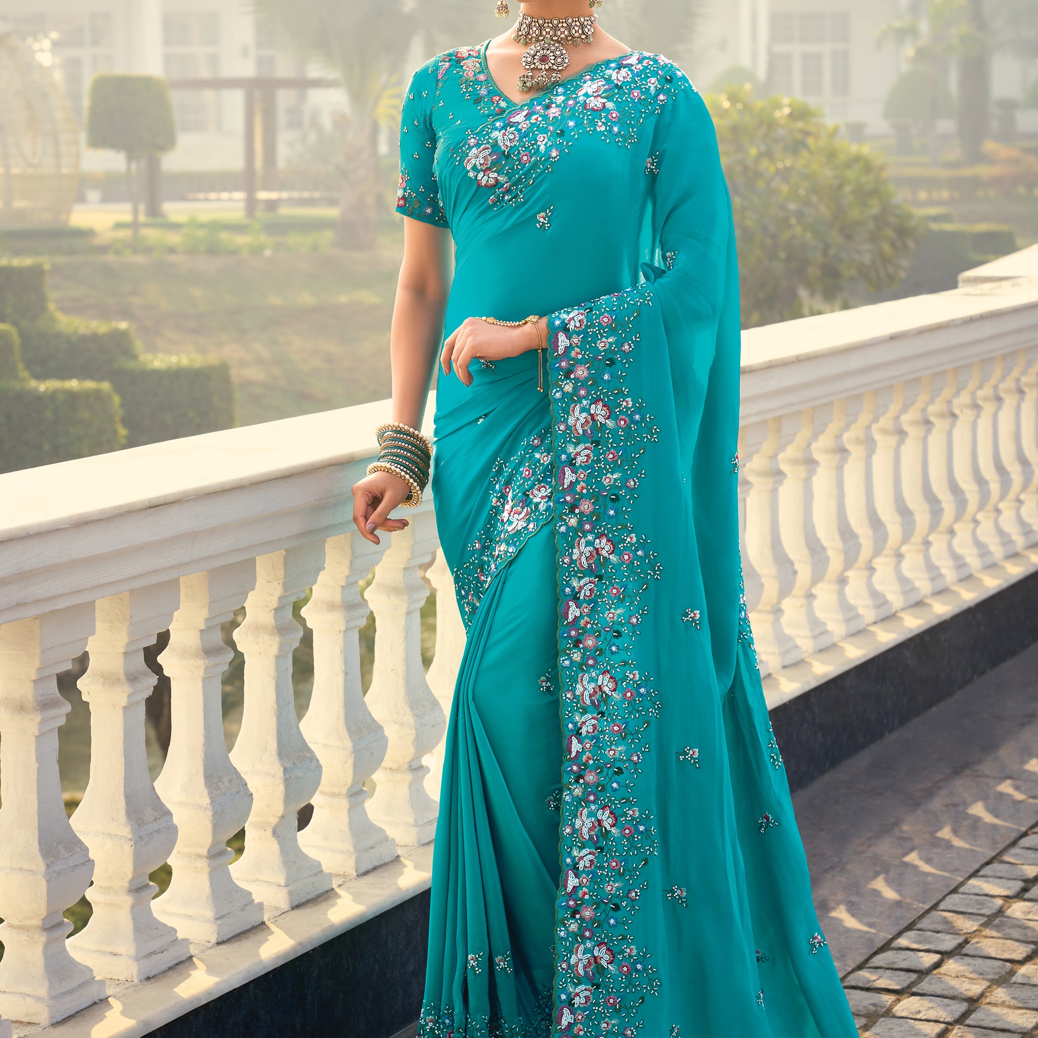 Fascinating Sky Blue Heavy Border Work Crape Silk Traditional Saree