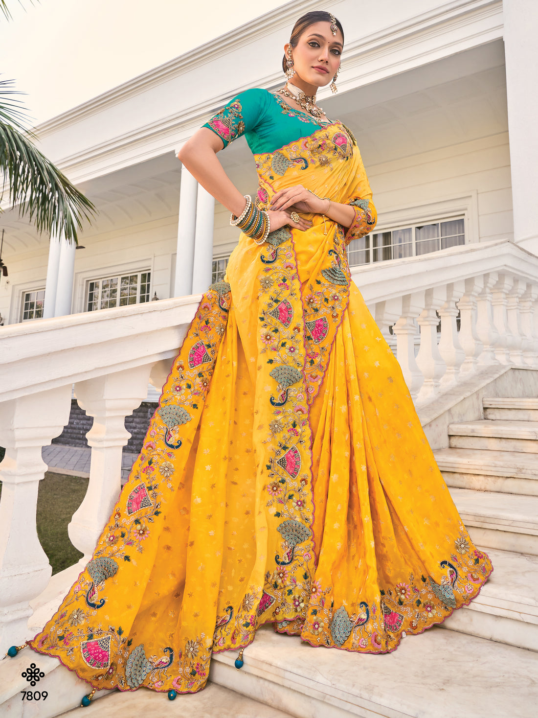 Captivating Yellow Heavy Border Work Crape Silk Wedding Wear Saree