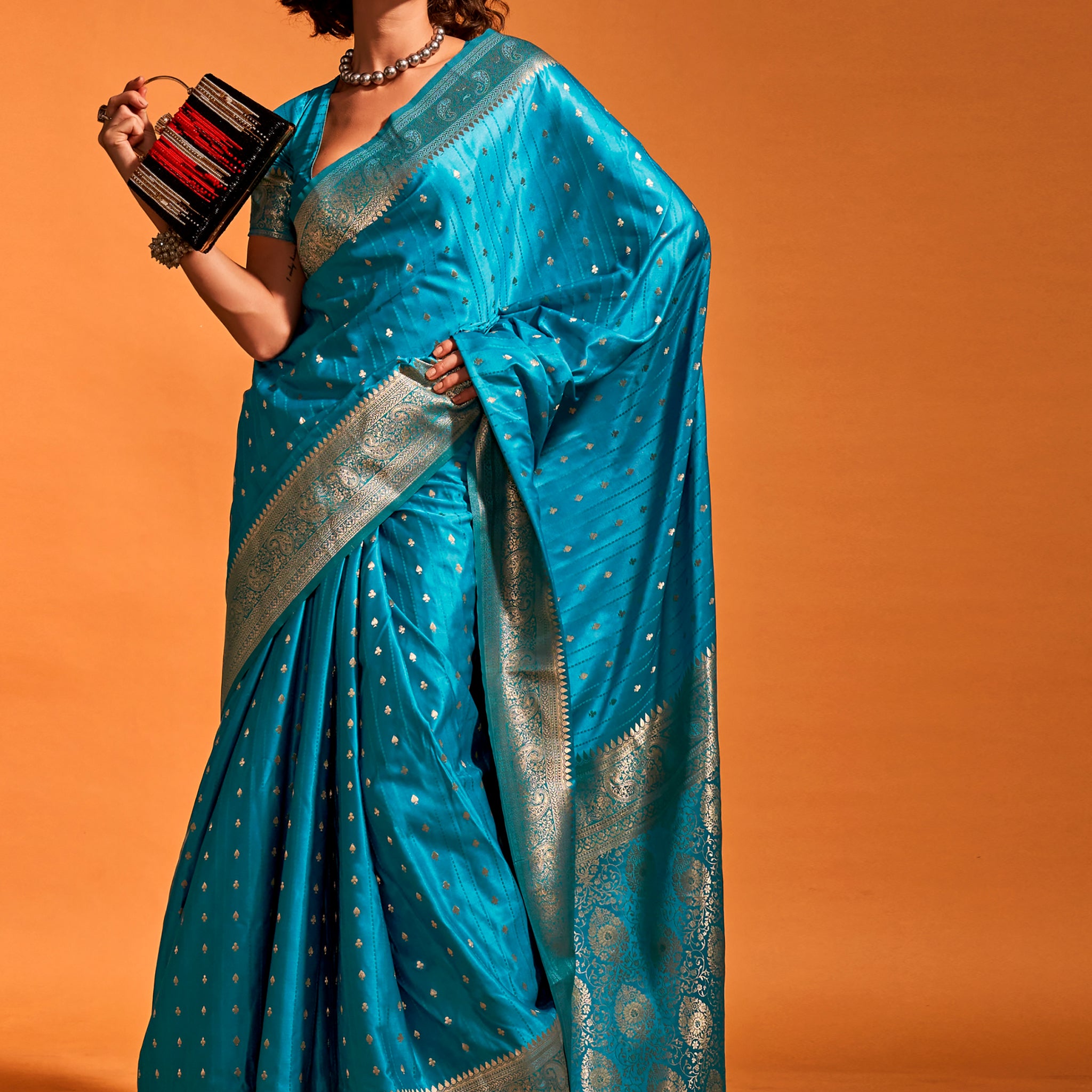 Charming Blue Zari Weaving Satin Reception Wear Saree With Blouse