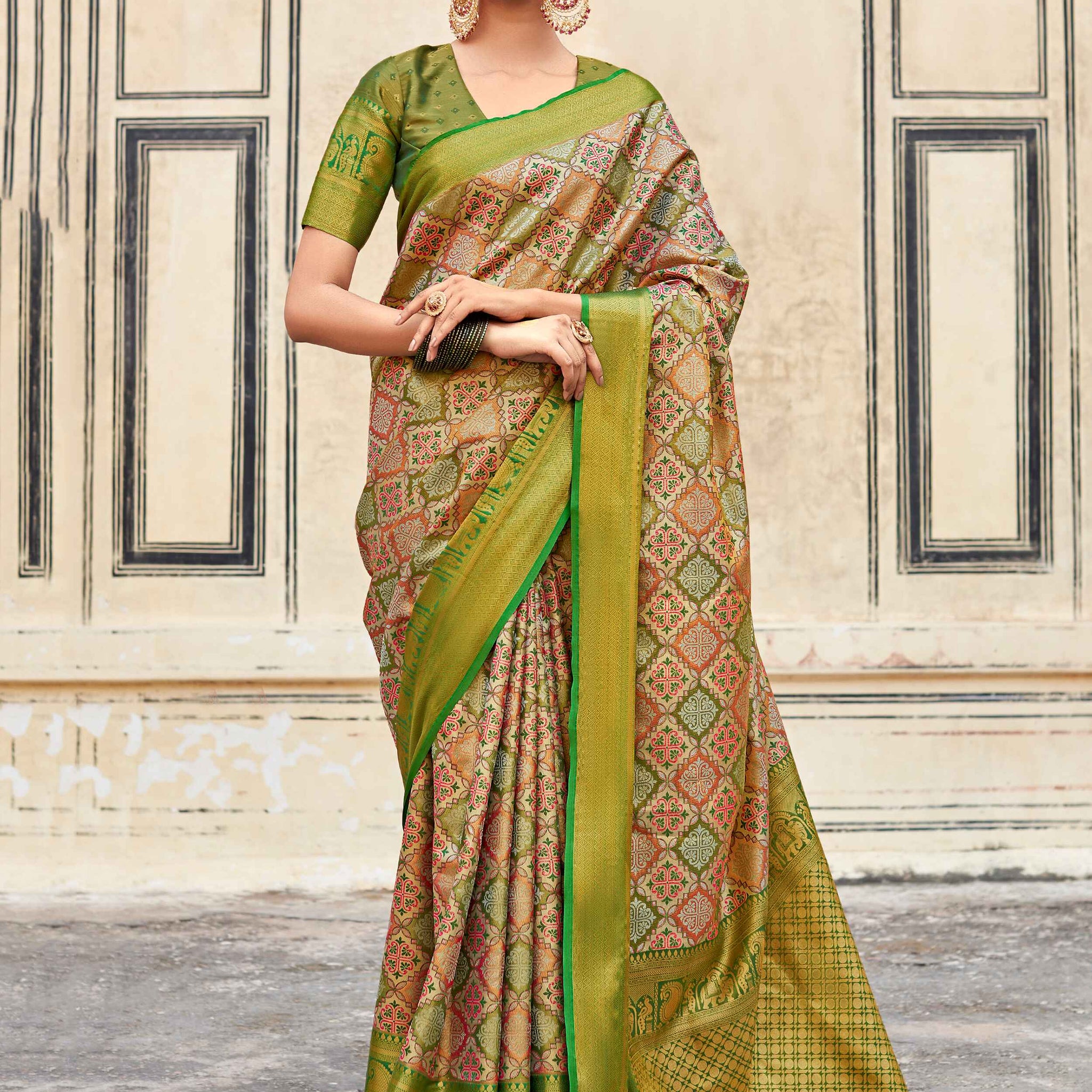Engaging Green Zari Weaving Silk Mehendi Wear Saree With Blouse