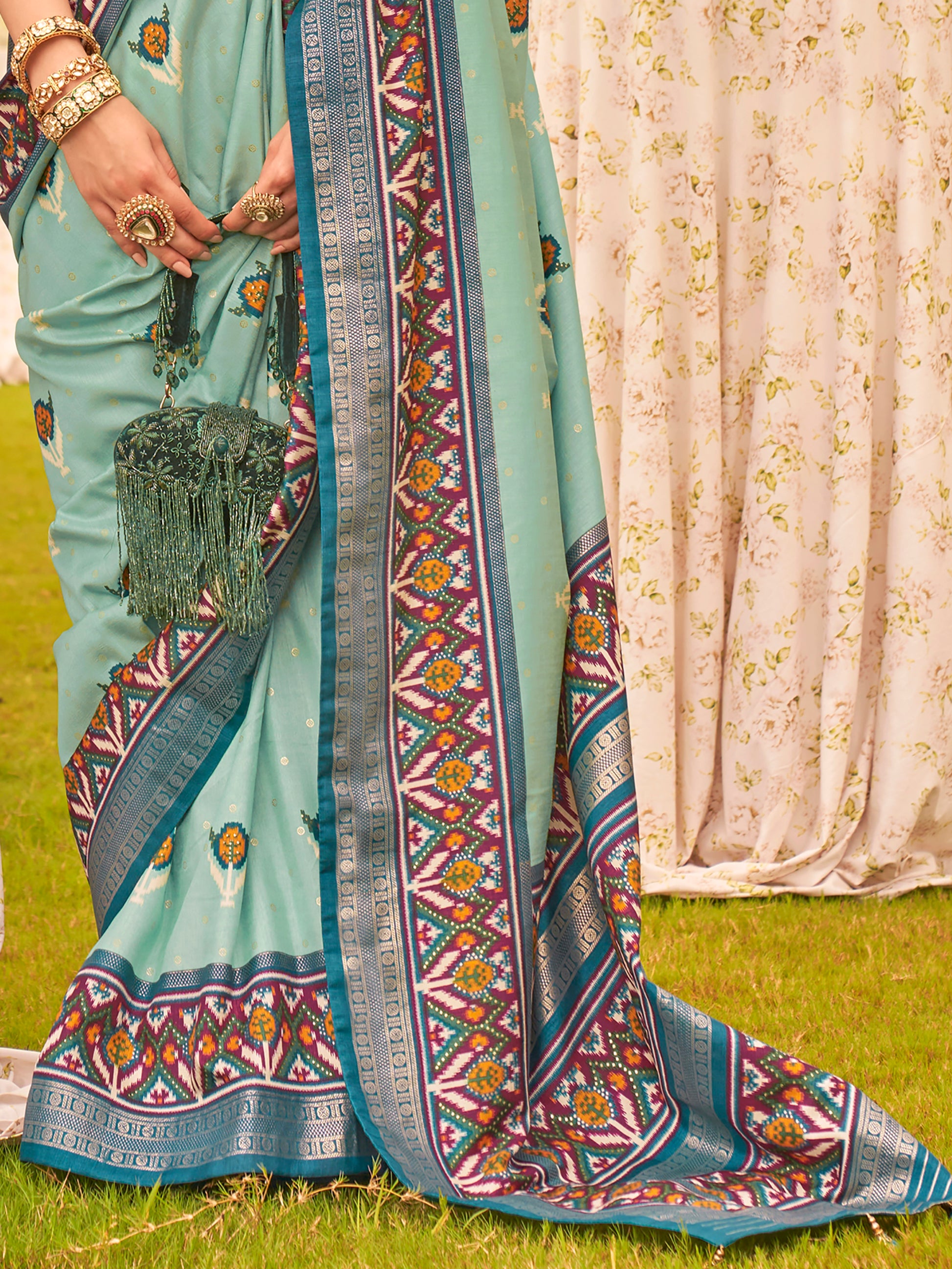Enchanting Sea Green Patola Printed Silk Reception Wear Saree
