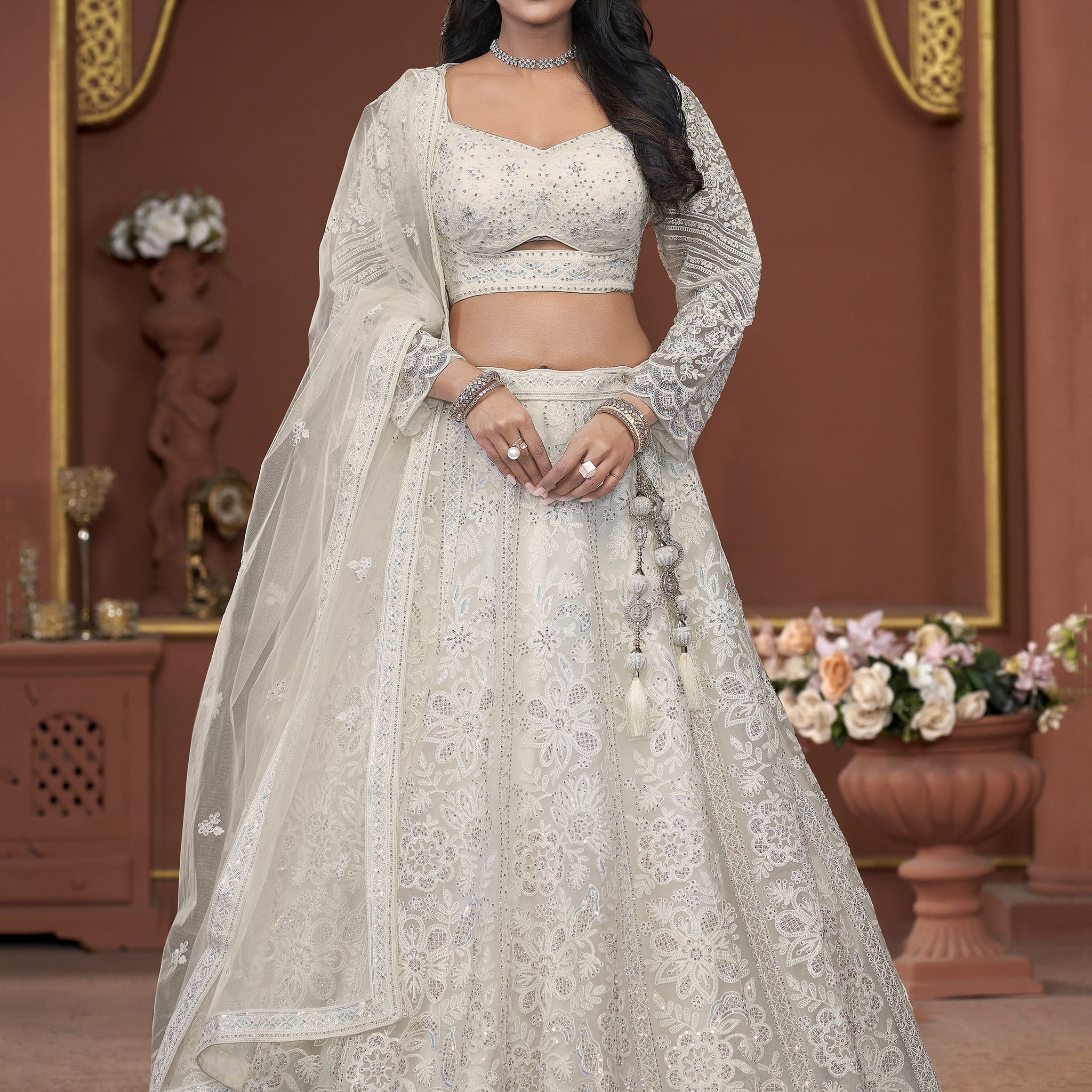 Adorable Off-White Sequins Net Engagement Wear Lehenga Choli