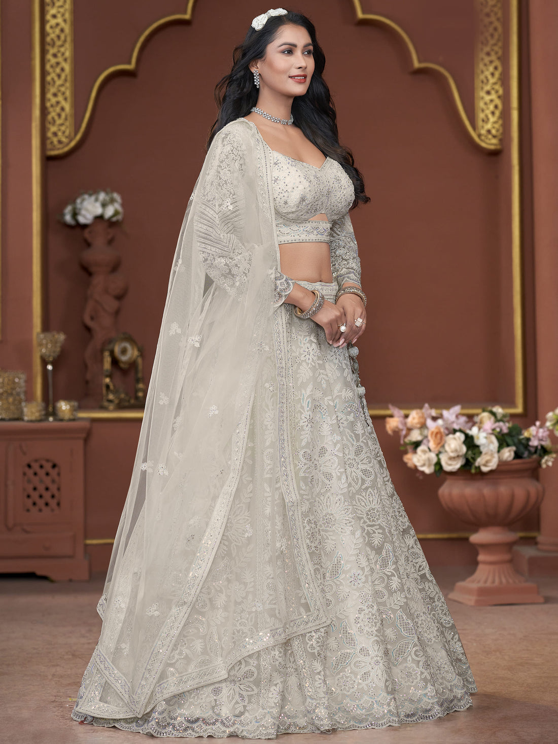 Adorable Off-White Sequins Net Engagement Wear Lehenga Choli