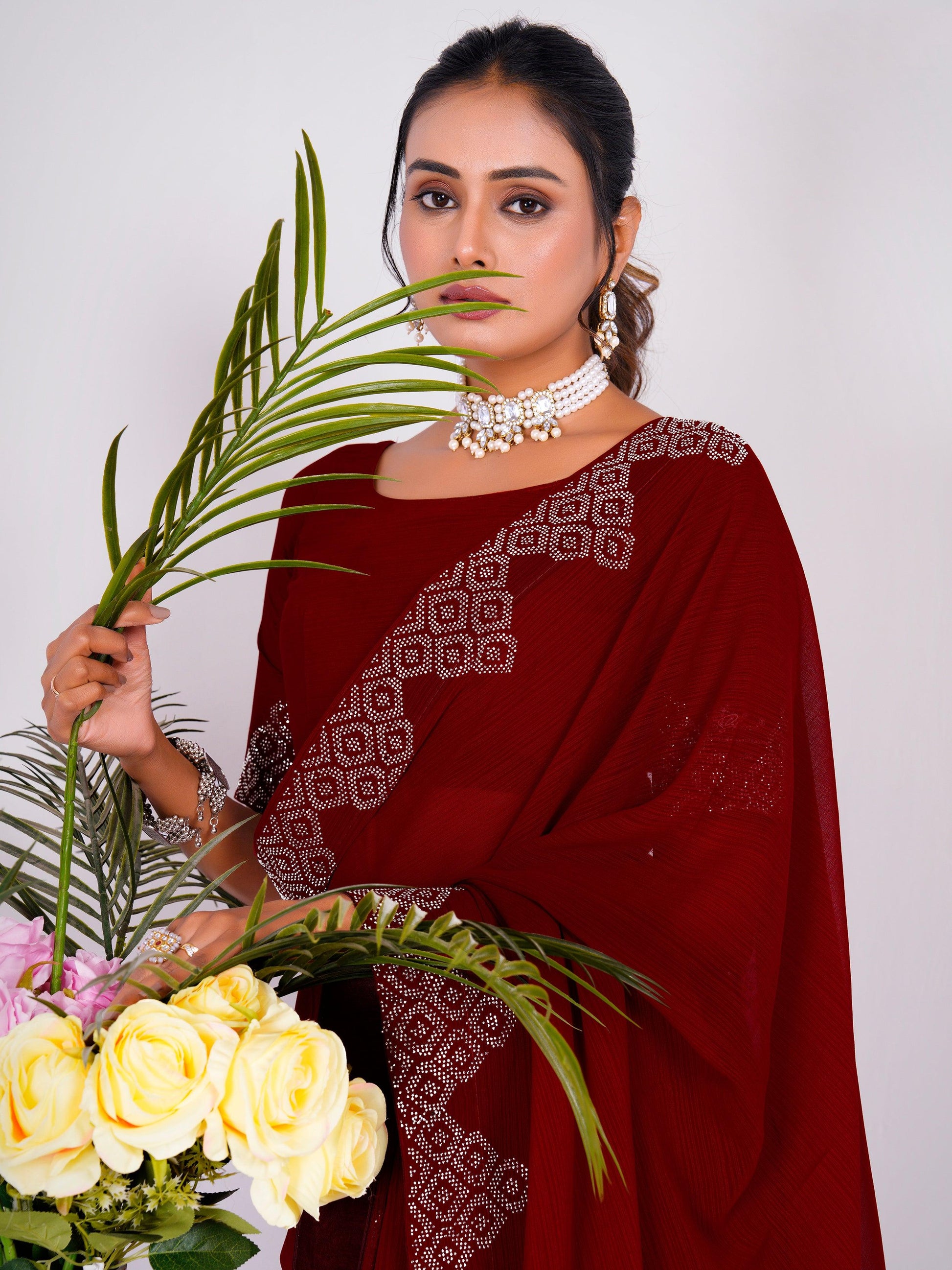 Astonishing Maroon Swarovski Work Georgette Saree With Blouse