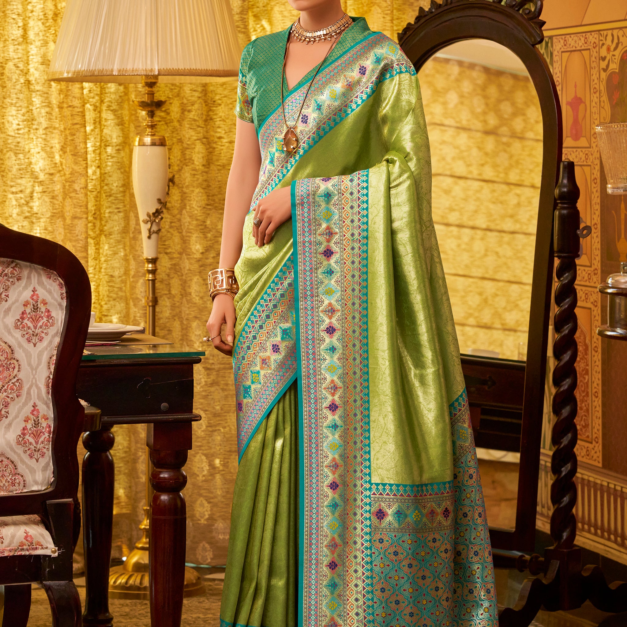 Beautiful Green Zari Weaving Tissue Silk Festive Wear Saree With Blouse