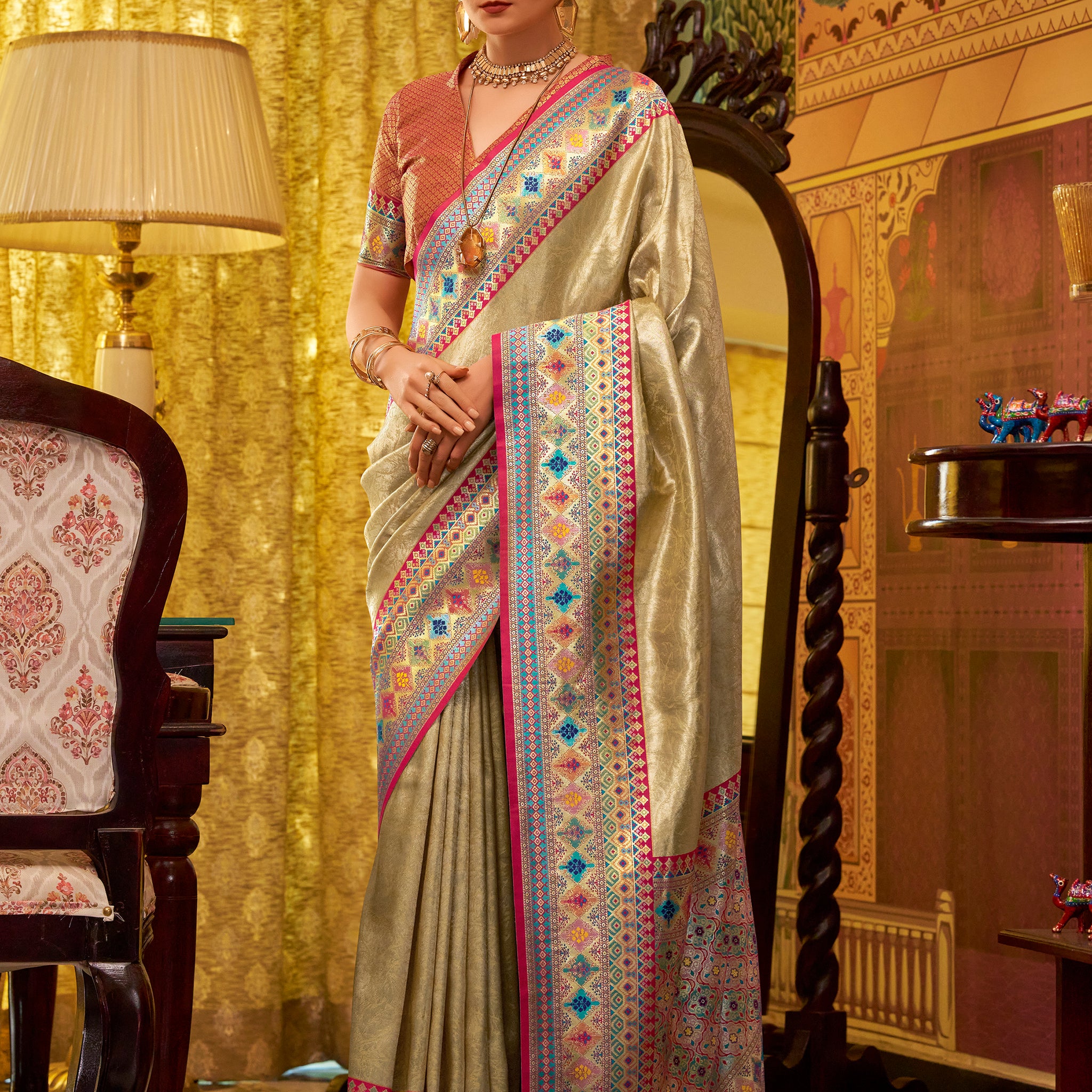 Bewitching Beige Zari Weaving Tissue Silk Event Wear Saree With Blouse