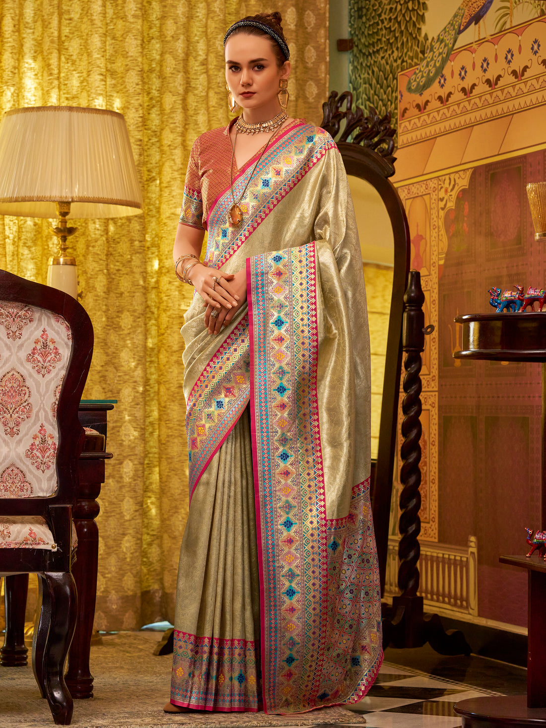 Bewitching Beige Zari Weaving Tissue Silk Event Wear Saree With Blouse