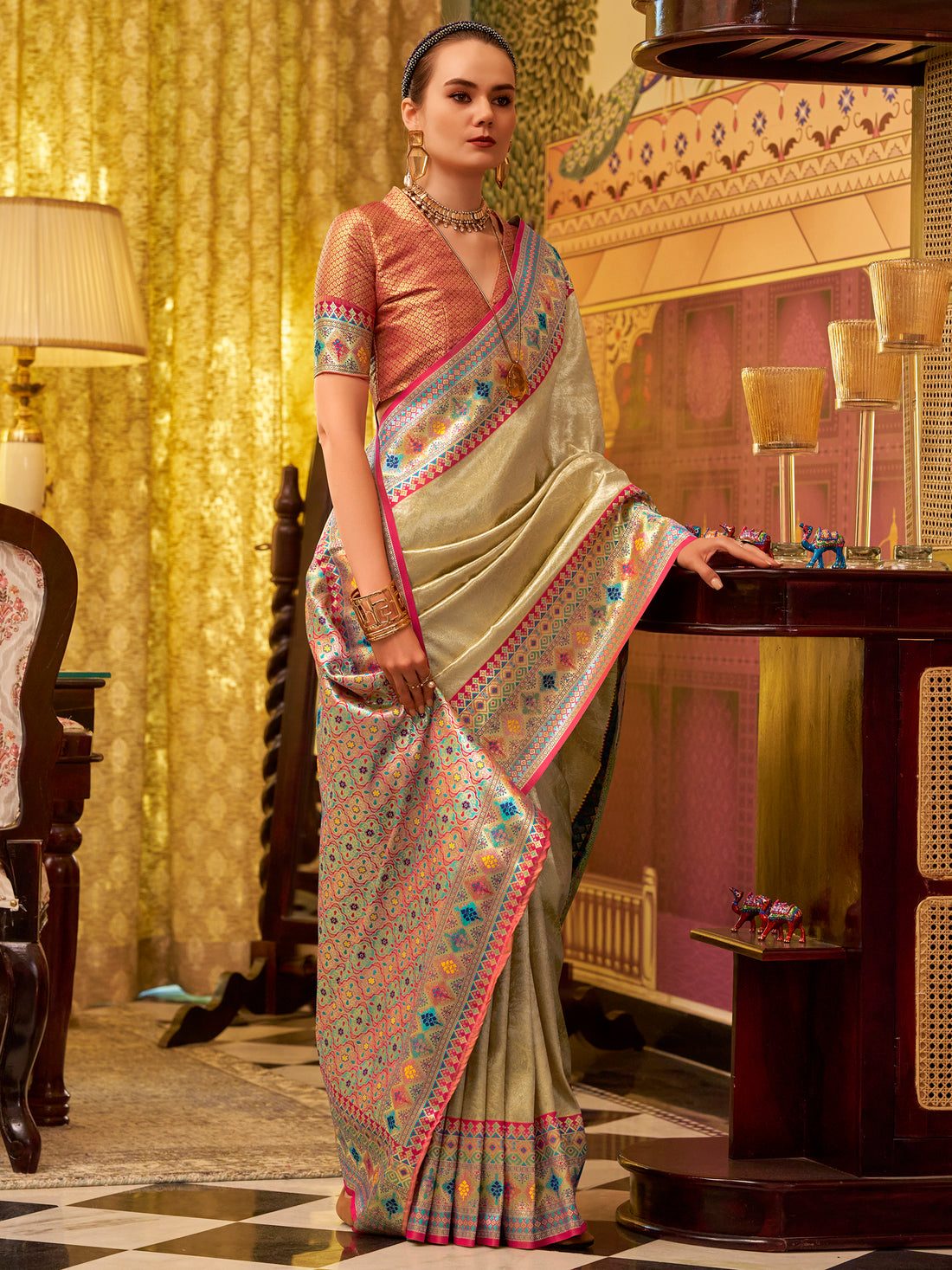 Bewitching Beige Zari Weaving Tissue Silk Event Wear Saree With Blouse
