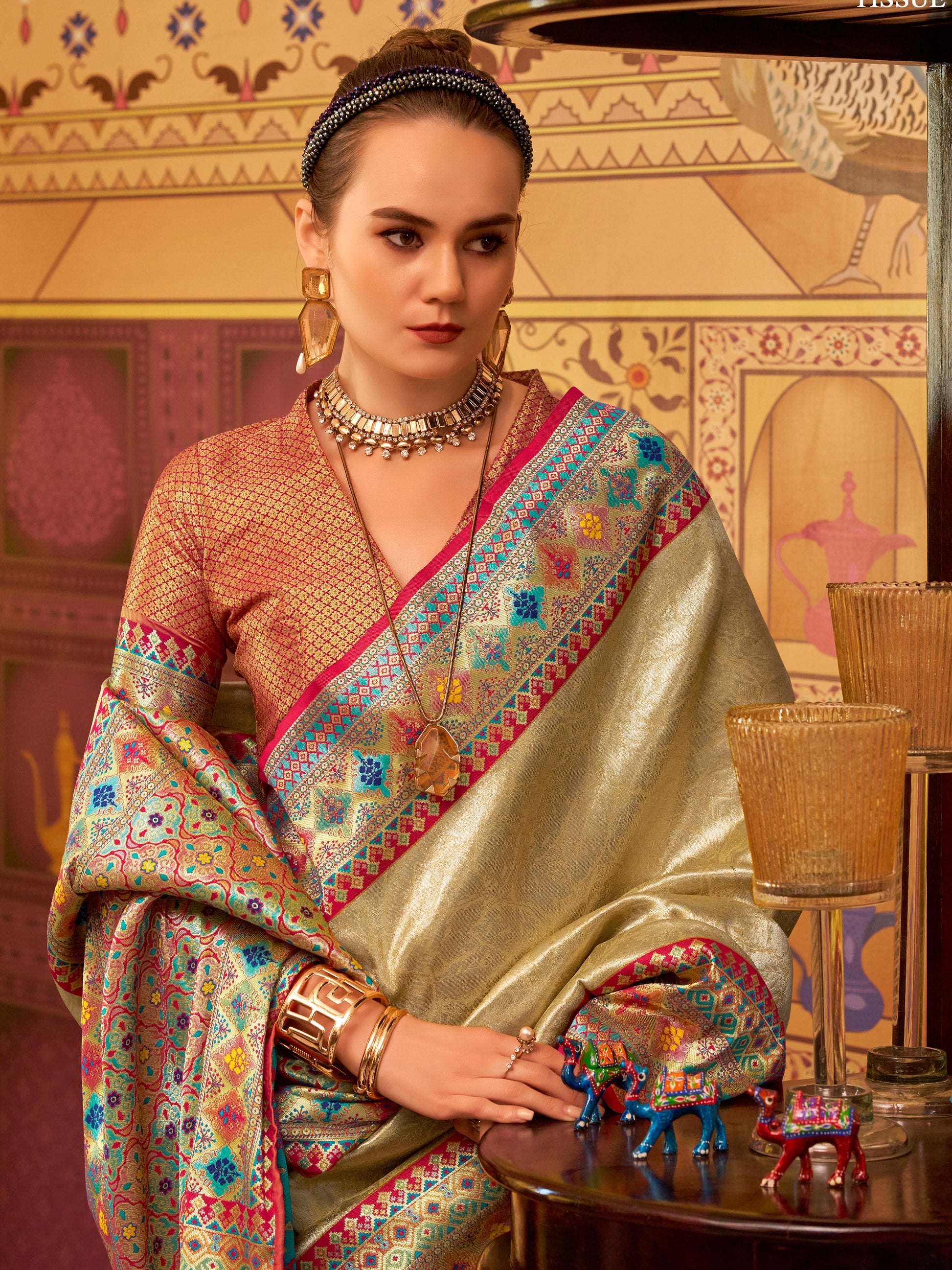 Bewitching Beige Zari Weaving Tissue Silk Event Wear Saree With Blouse