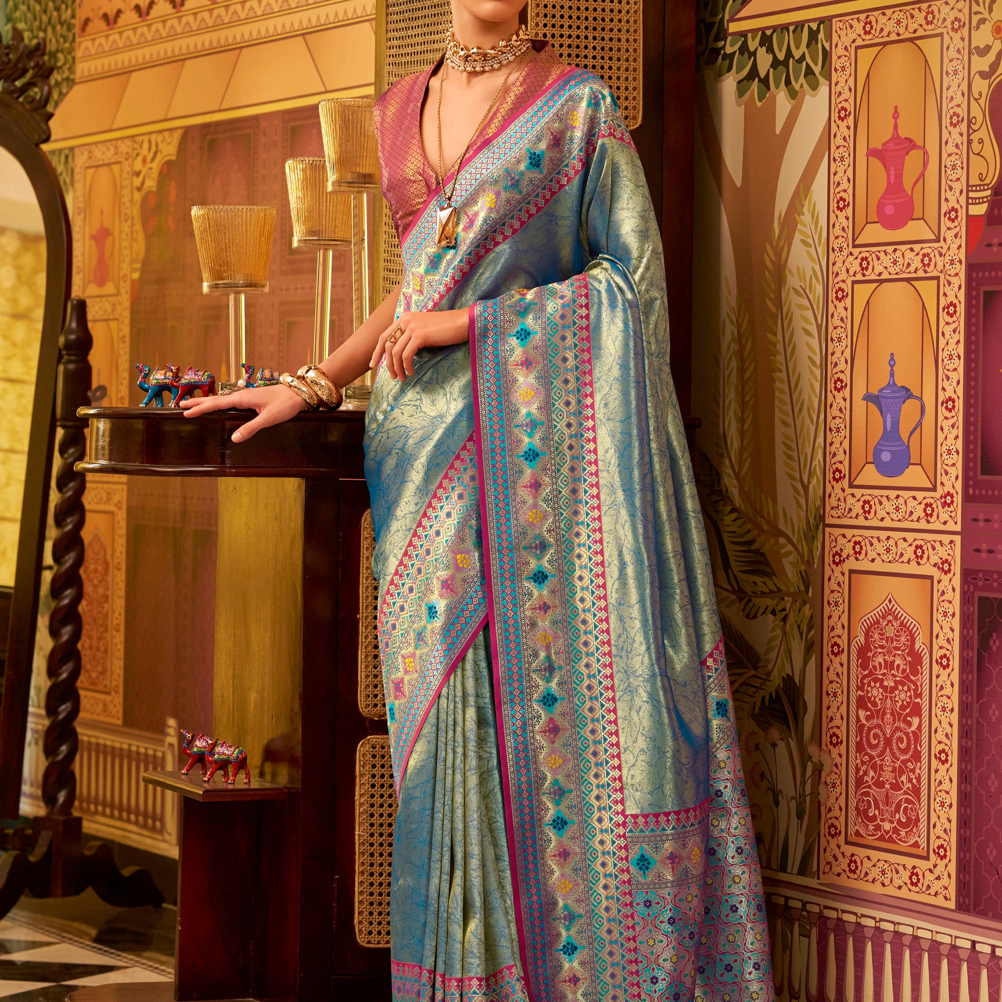 Stunning Teal Blue Zari Weaving Tissue Silk Festive Wear Saree With Blouse