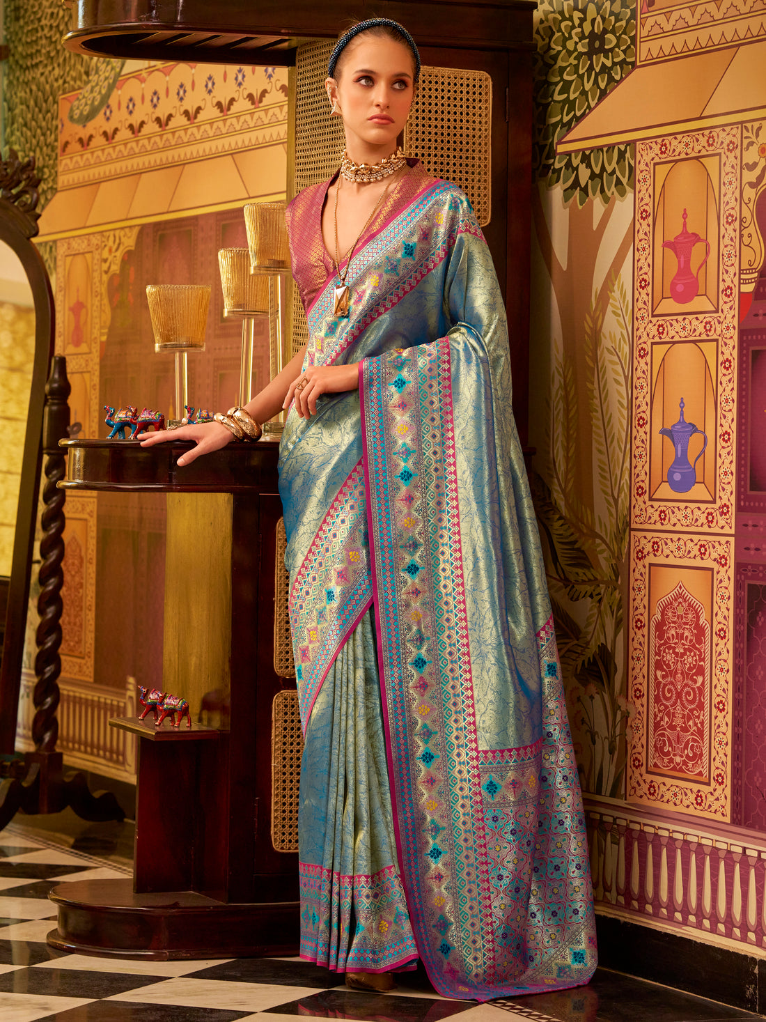 Stunning Teal Blue Zari Weaving Tissue Silk Festive Wear Saree With Blouse