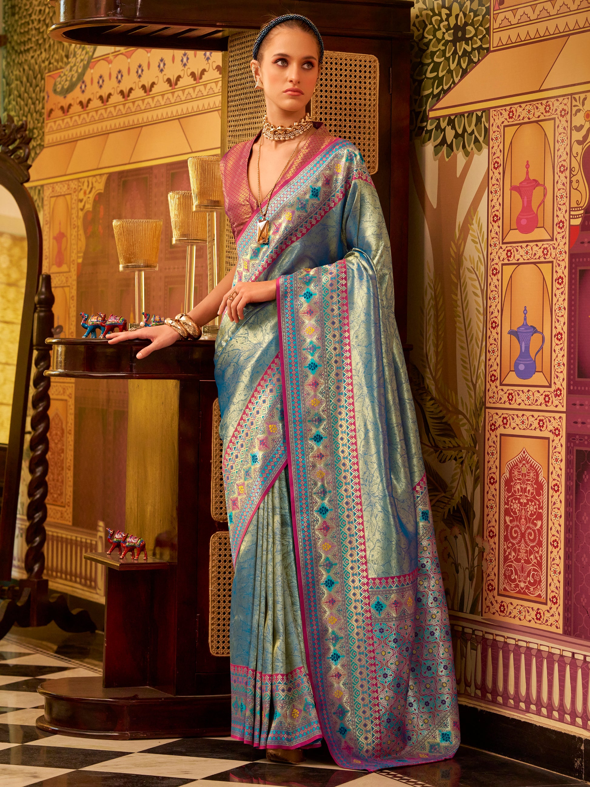 Stunning Teal Blue Zari Weaving Tissue Silk Festive Wear Saree With Blouse