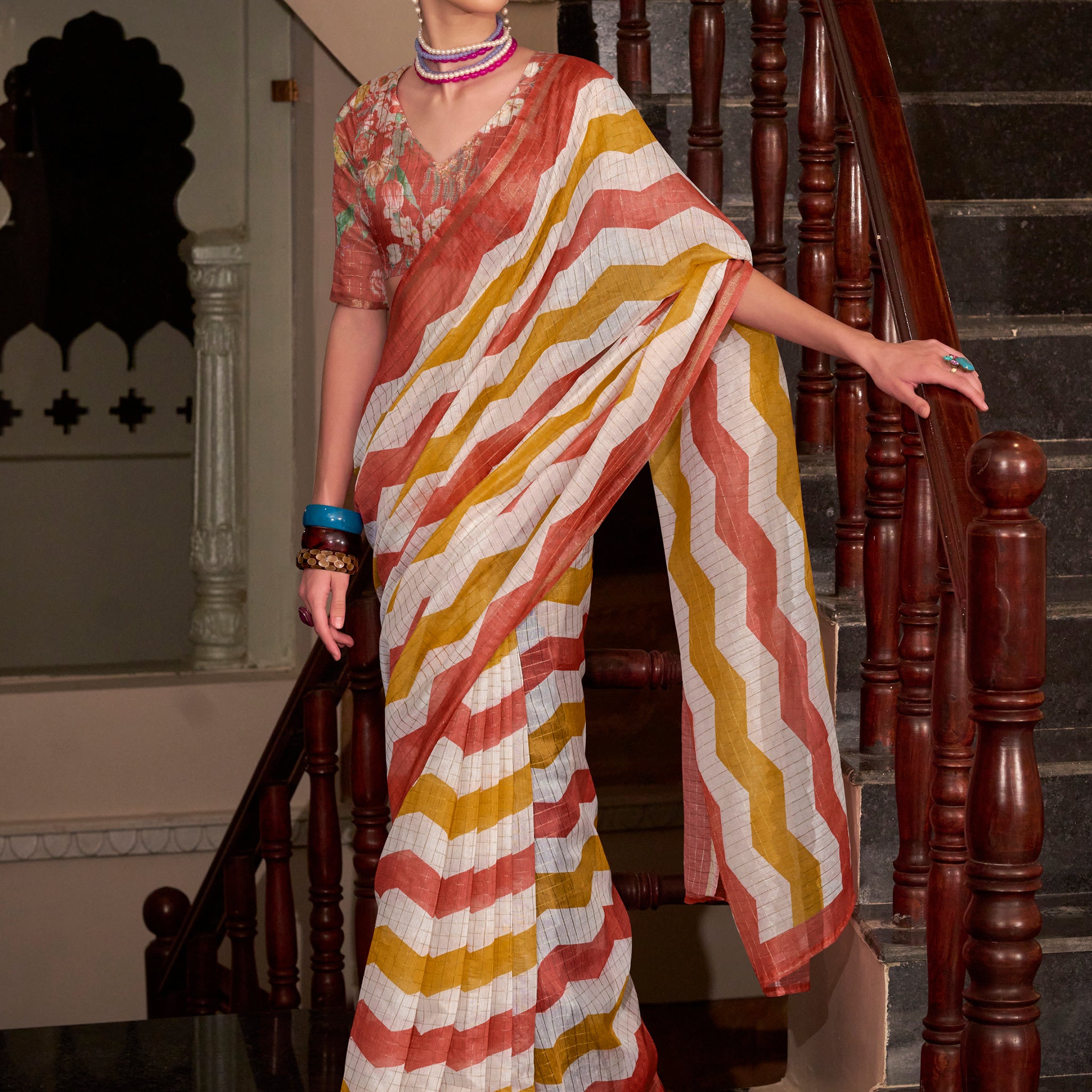Spectacular Orange Printed Cotton Saree With Floral Printed Blouse